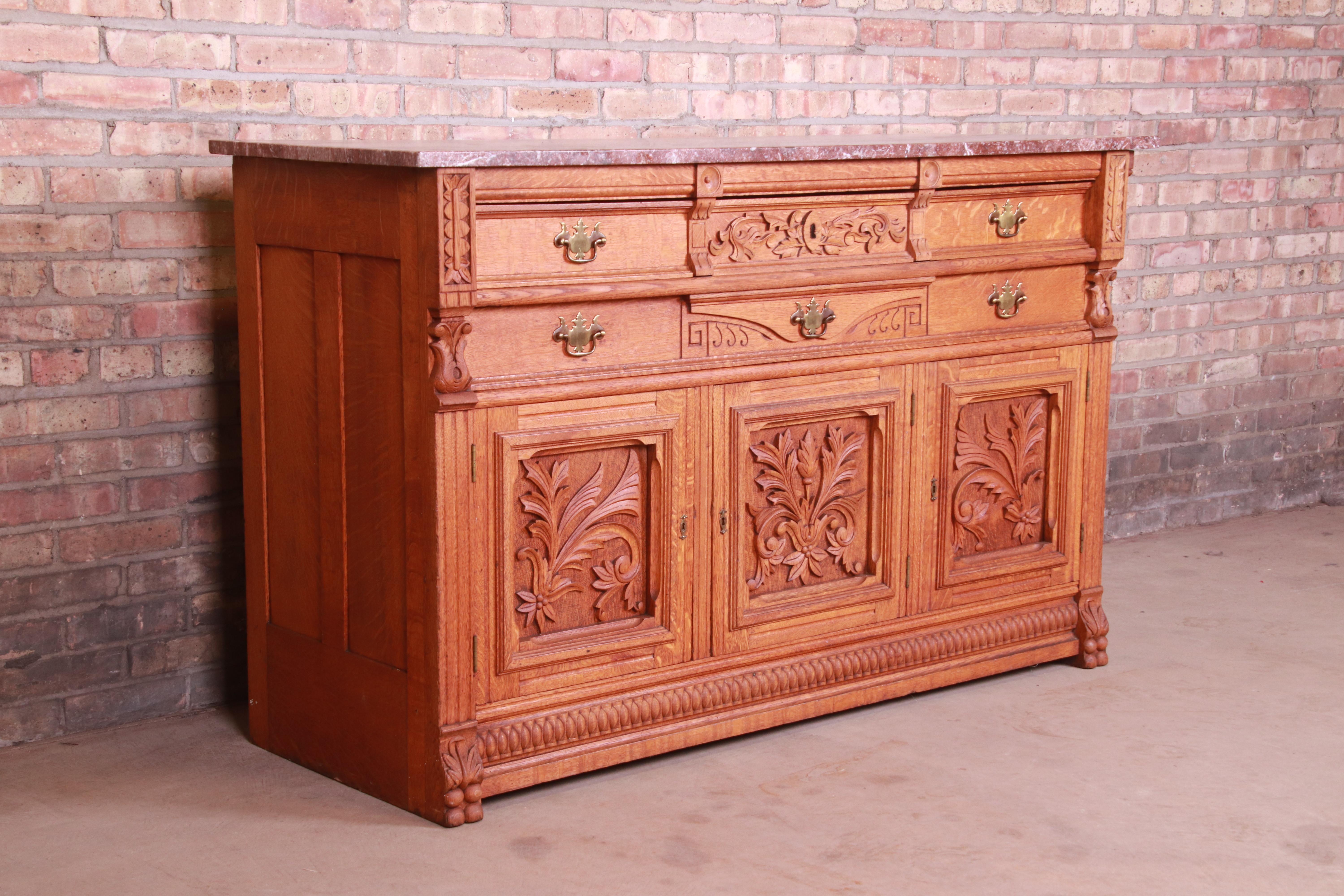 Antique Carved Oak Marble Top Sideboard Attributed to Horner, circa 1890s In Good Condition In South Bend, IN