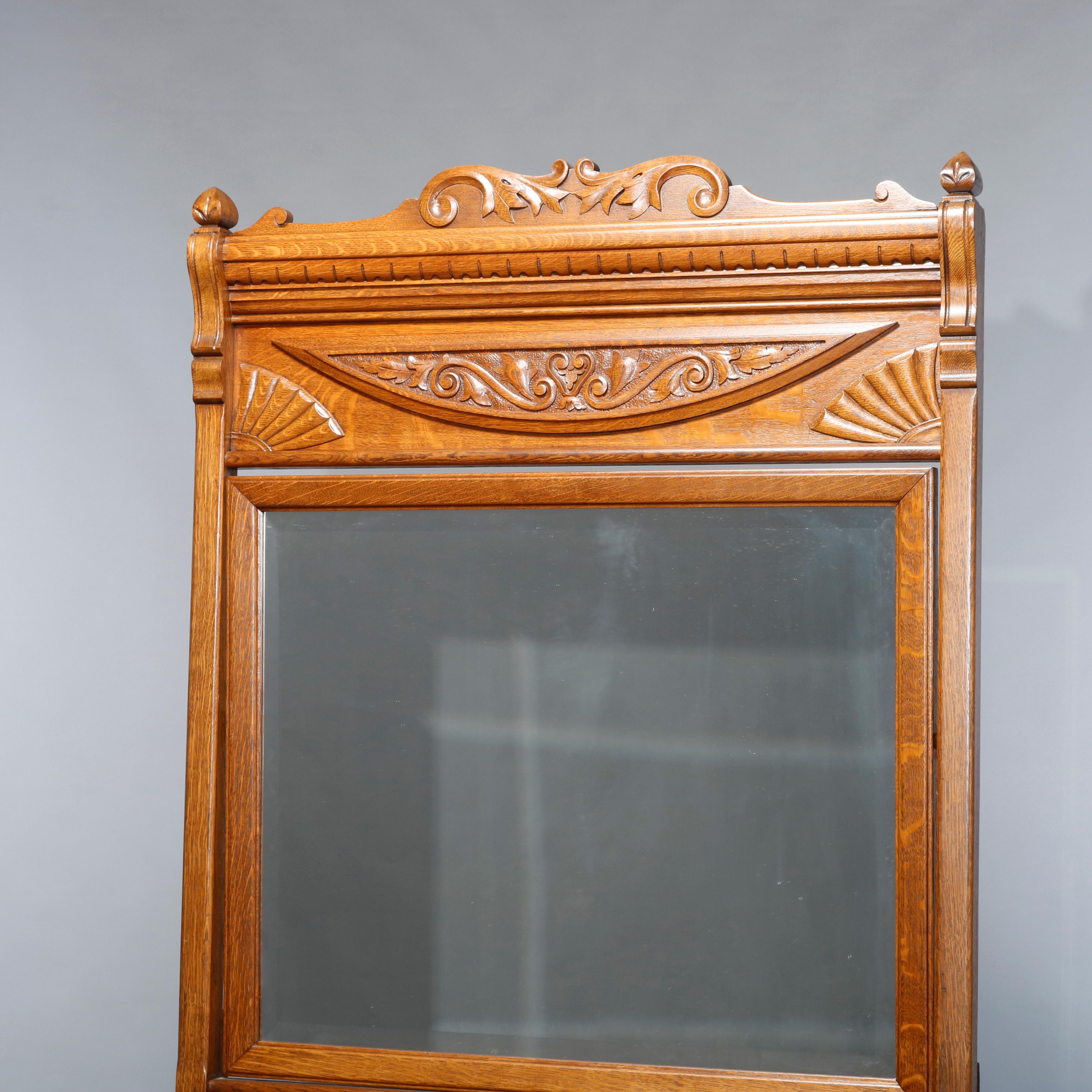 An antique chest of drawers in the manner of RJ Horner offers four drawer dresser with mirror having carved frame with stylized fan and foliate elements, c1900

Measures: 83.5