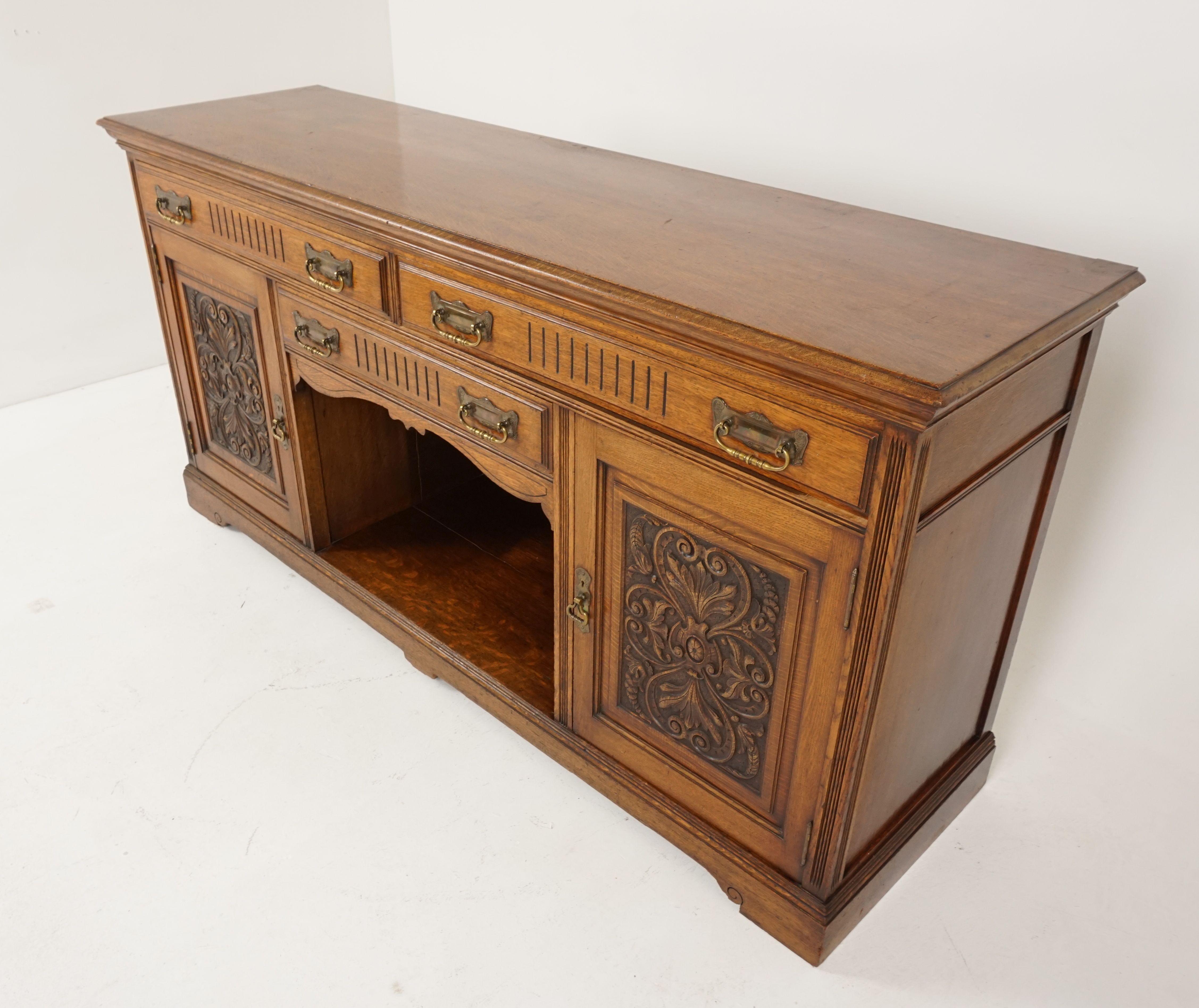 Antique carved oak sideboard, buffet, Scotland 1900, H135

Scotland 1900
Solid oak
Original finish
Rectangular moulded top
Pair of long dovetailed drawers on top
Smaller central drawer underneath
All with original brass hardware
The center has an