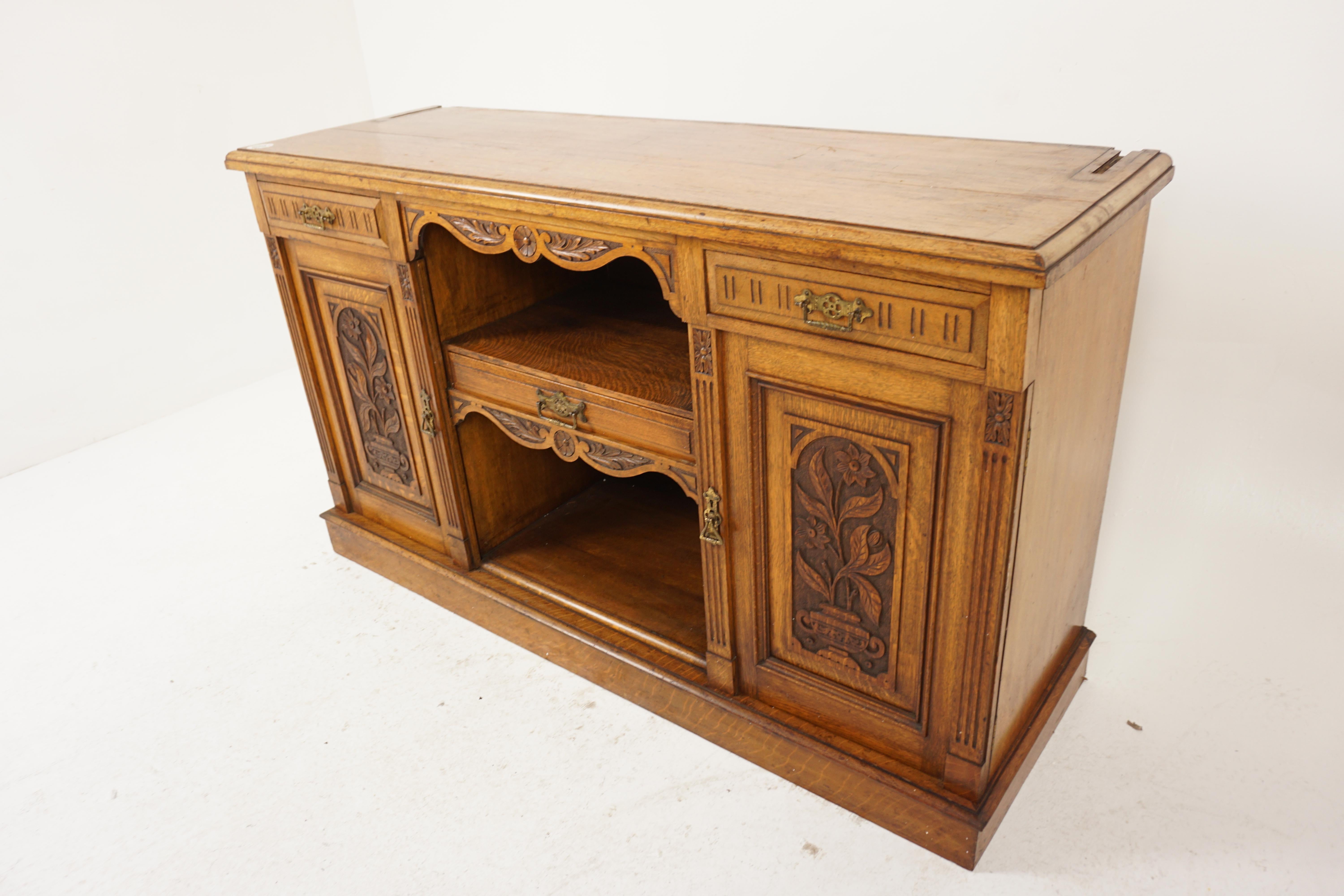 Antique Carved Oak Sideboard, Buffet, Server, Scotland 1880, H644

Scotland 1880
Solid Oak
Original finish
Rectangular moulded top
Pair of carved drawers
Single carved drawer in the center with open space above and below
Pair of carved doors