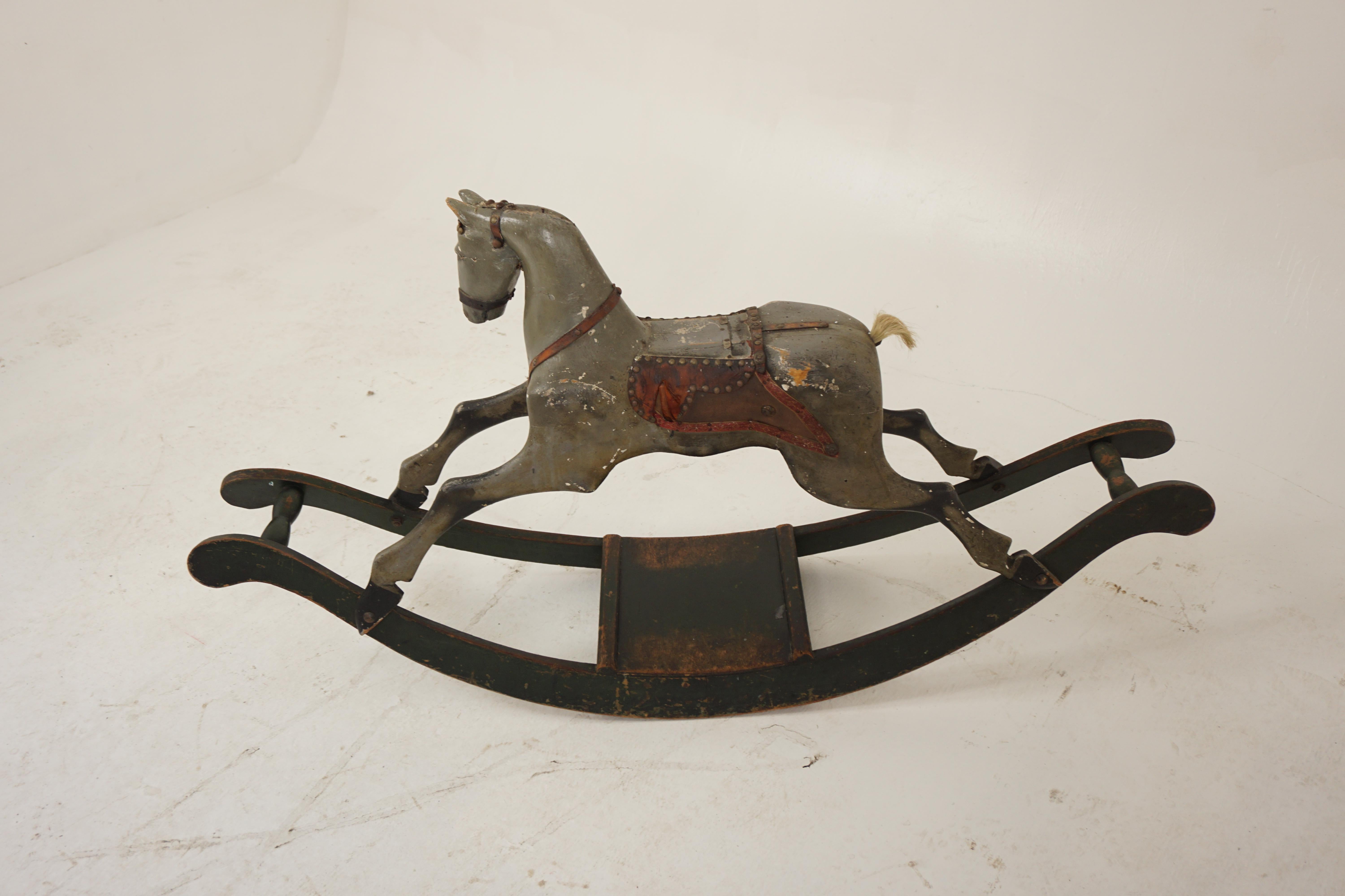 Antique Carved Painted Rocking Horse, Scotland 1860, H948

Scotland 1860
Solid Pine
Original Finish
Painted hues of grey and green
Horse hair tail
The well carved painted horse with flared nostrils and open mouth
The body with remnants of