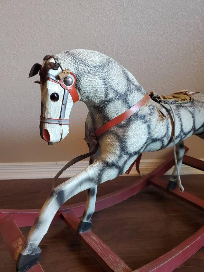 carved wooden rocking horse