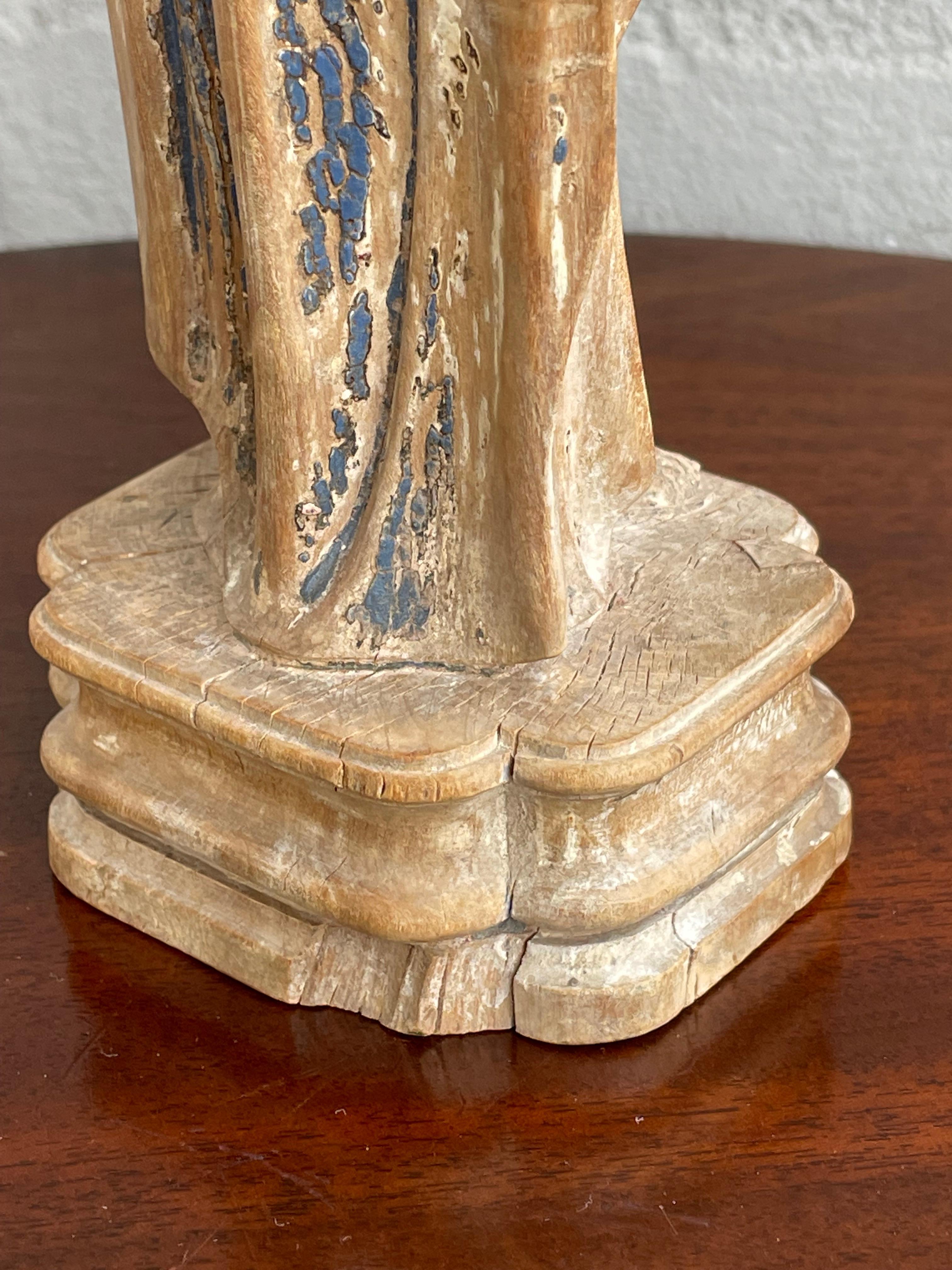 Antique Carved Palmwood Mary Magdalene Sculpture w. Porcelain Eyes 1680 - 1720 In Good Condition In Lisse, NL