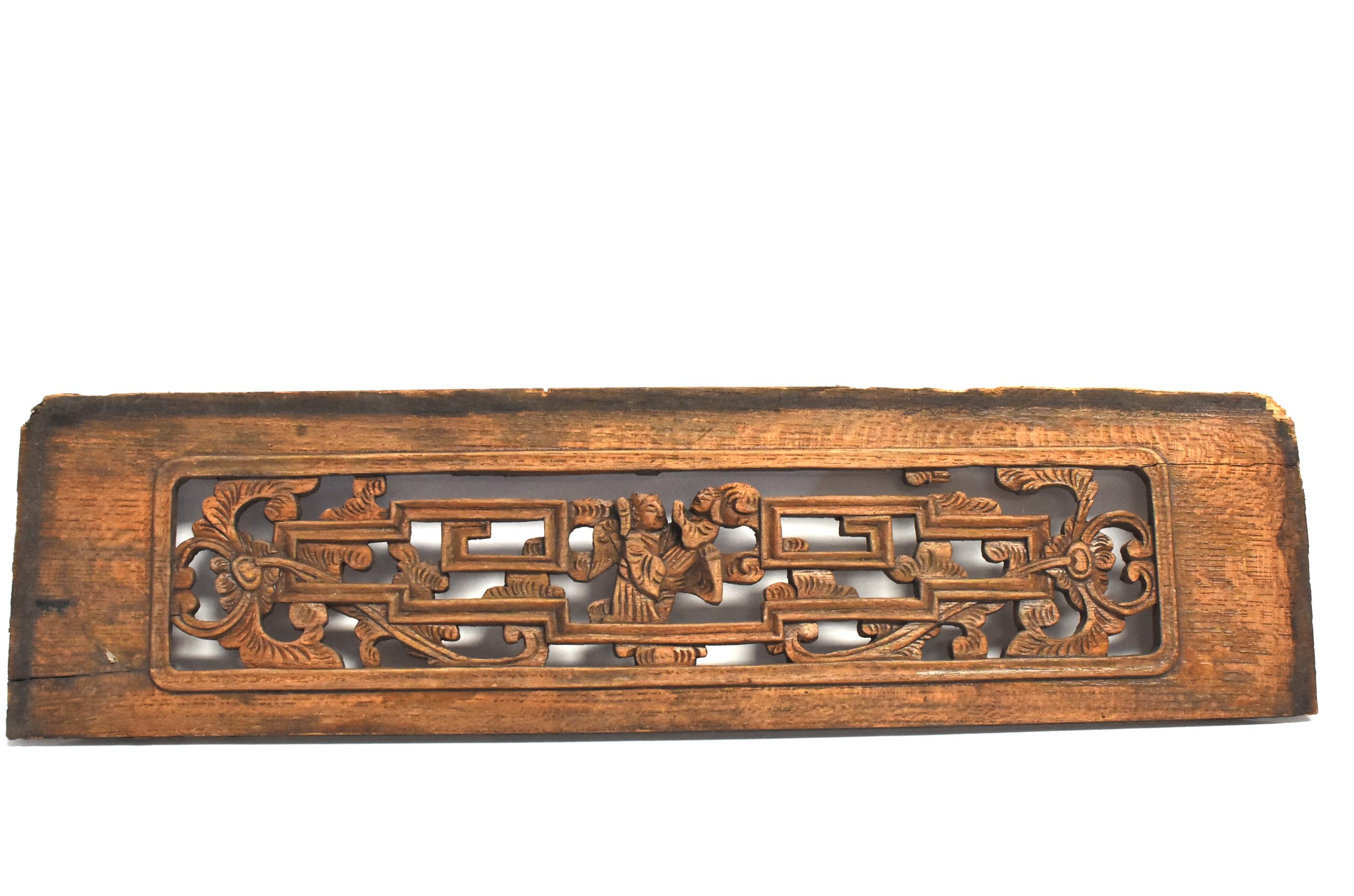 A wonderful set of two 19th century wood carvings, each respectively featuring father and grandfather holding a new baby. Eternity scrolls intertwined with peony stems, symbols of longevity and prosperity. Vivid expressions.