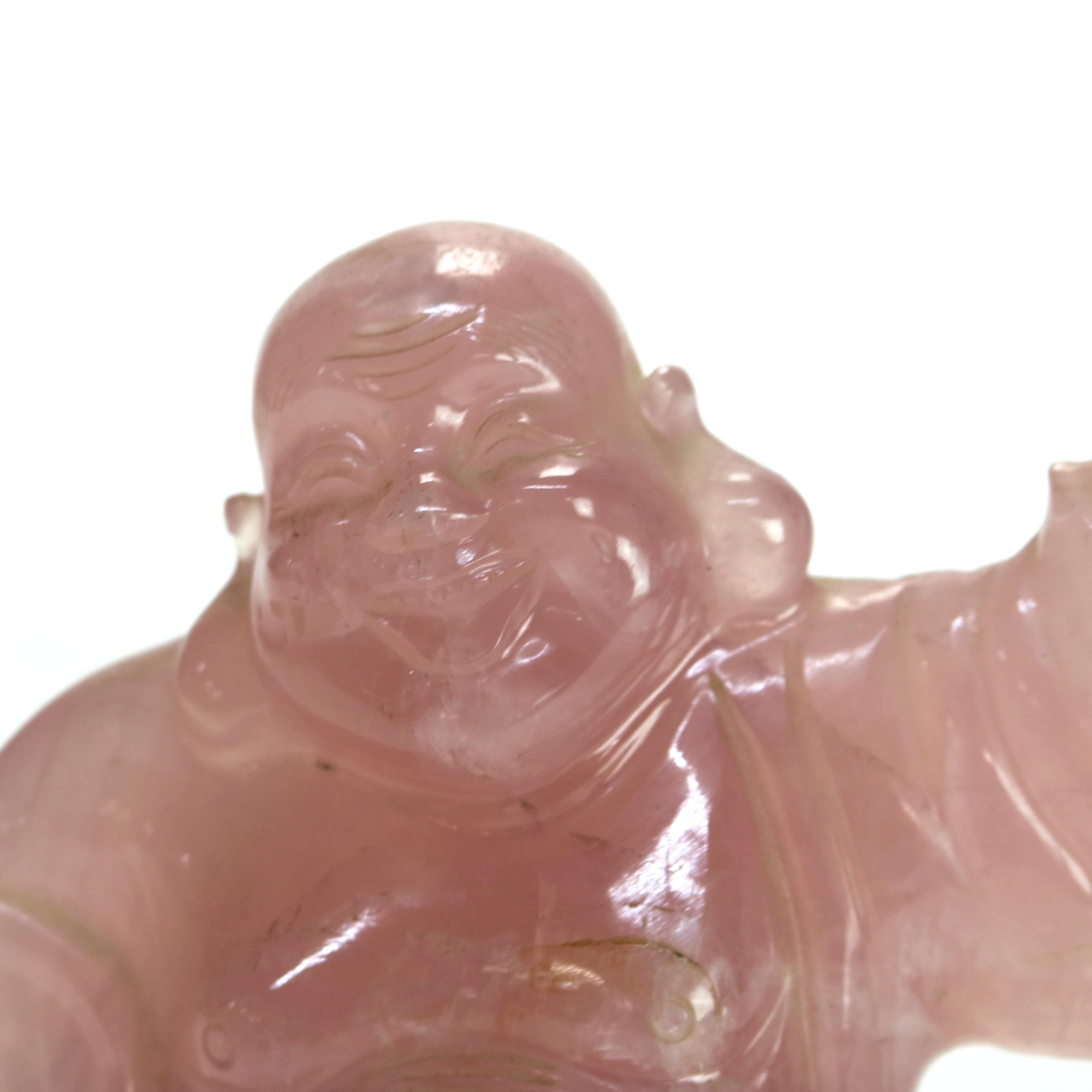 Antigua figura de Buda sonriente tallada en cuarzo rosa C1920

Medidas - 6,75