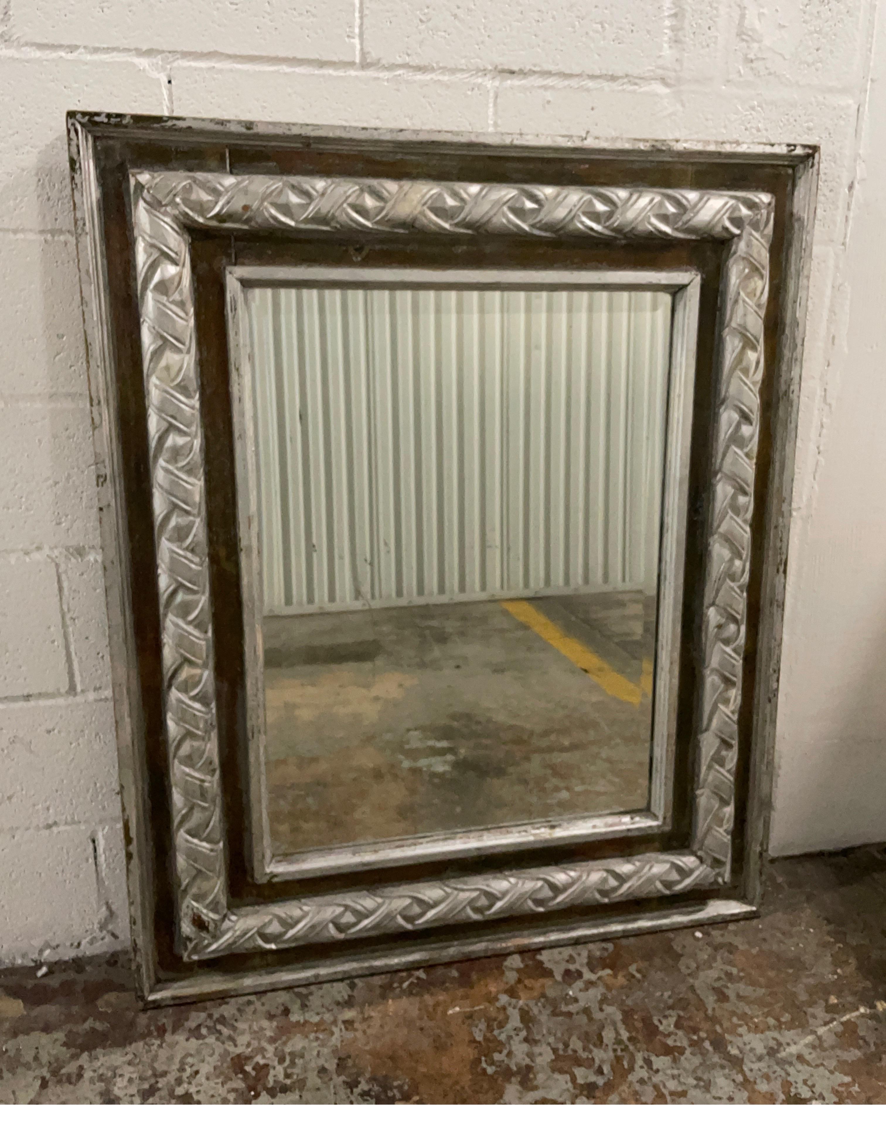 Large antique carved & silver gilded mirror.