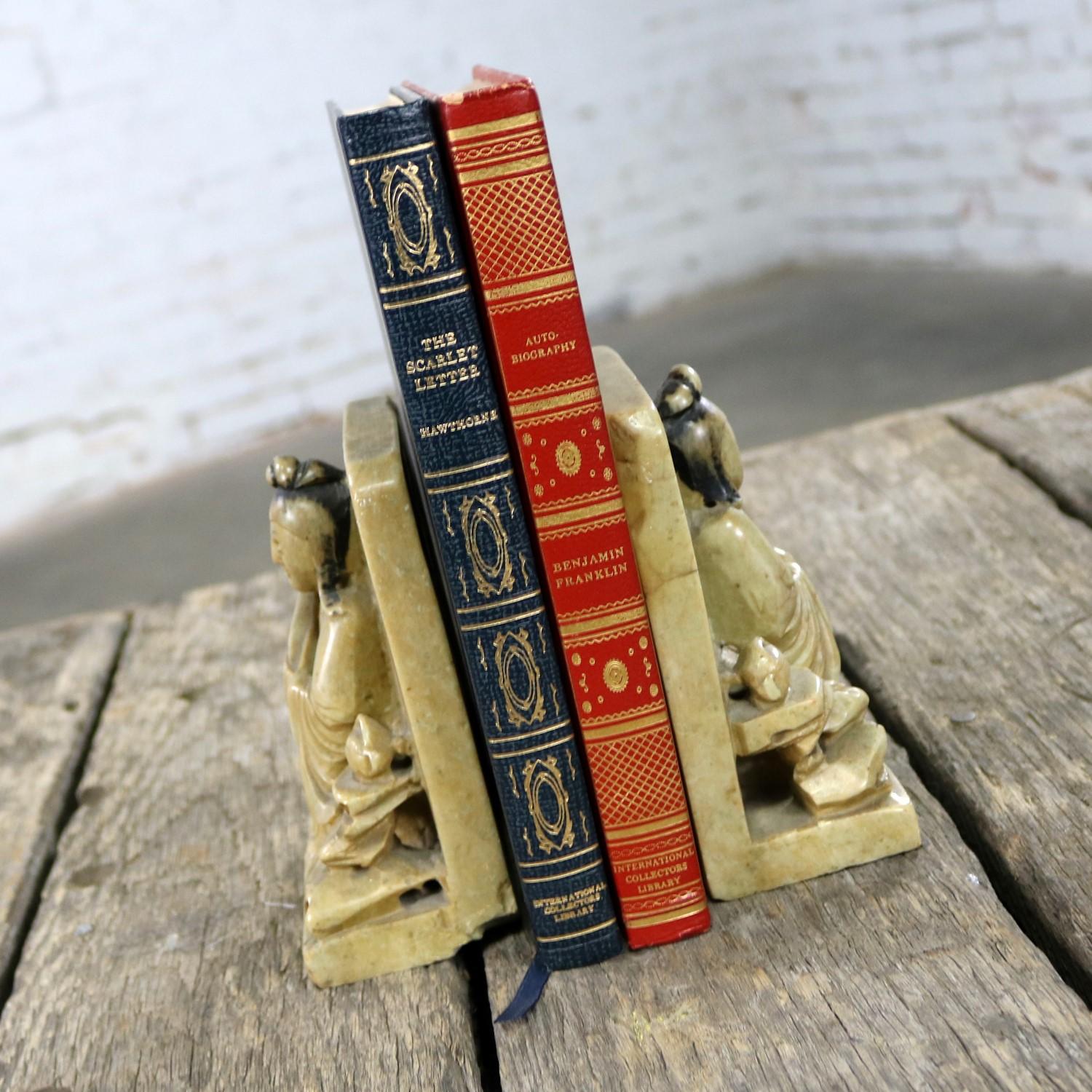 Chinese Export Antique Carved Soapstone Bookends with Chinese Figures and Teapot Detail For Sale