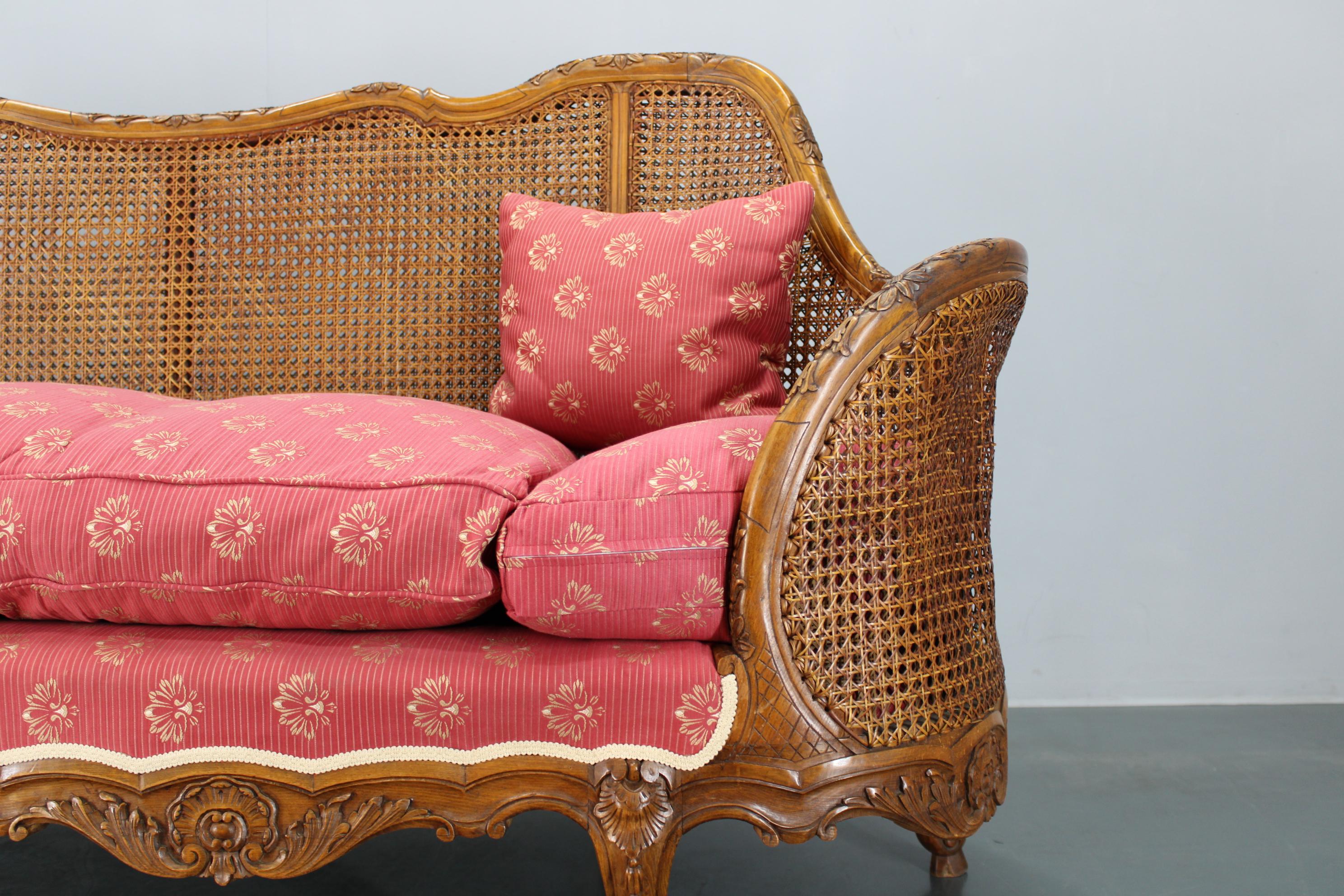 Inizio XX secolo Antique Carved Sofa with Cane Sides , Czechoslovakia in vendita