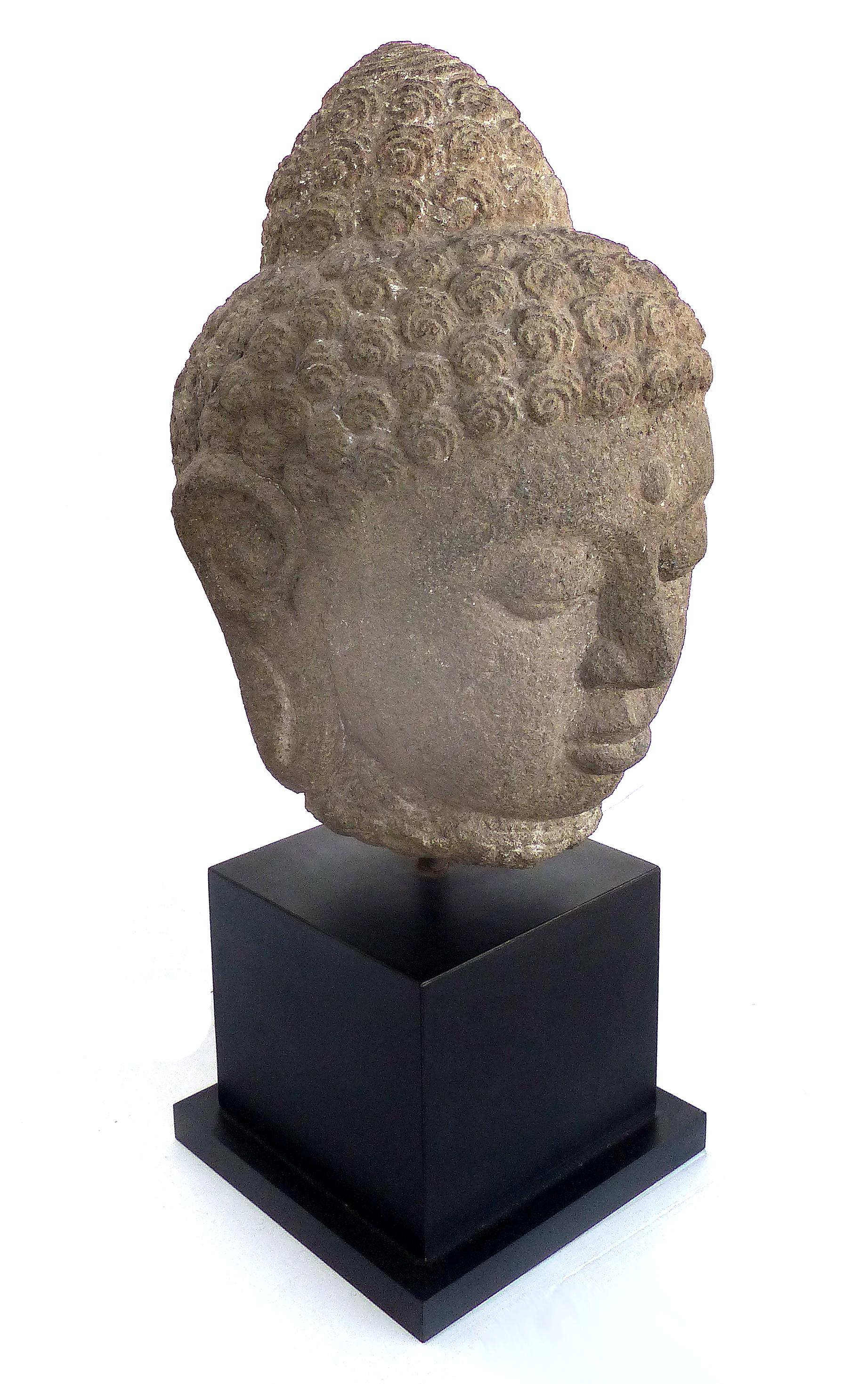Ancient Carved Stone Buddha Head Sculpture, Provenance Royal-Athena Galleries NY

Offered for sale is an ancient carved stone Buddha head sculpture which was acquired at Royal-Athena Galleries, NY.  This ancient sculpture has been raised on a modern