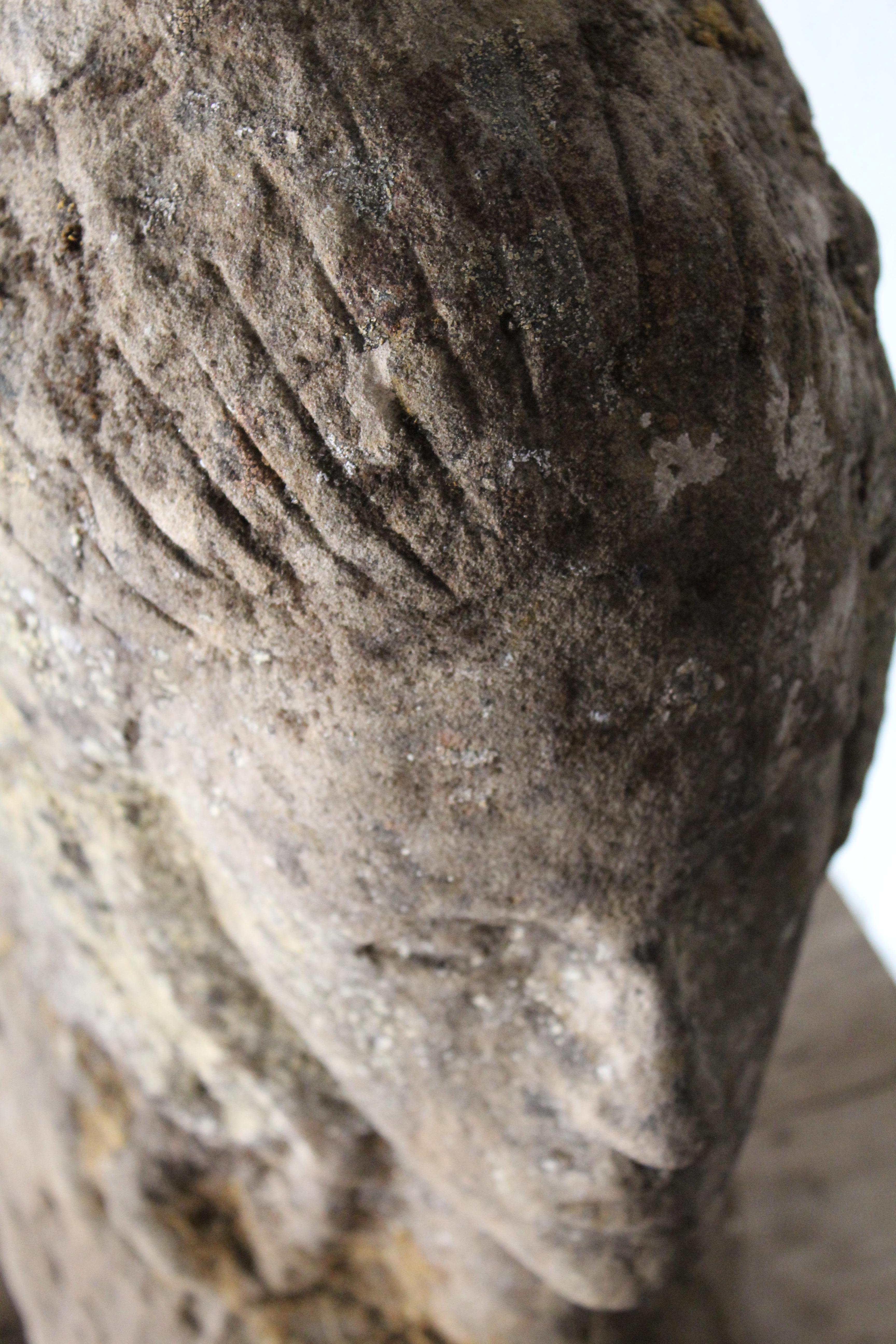 Elegantly carved antique stone bust.