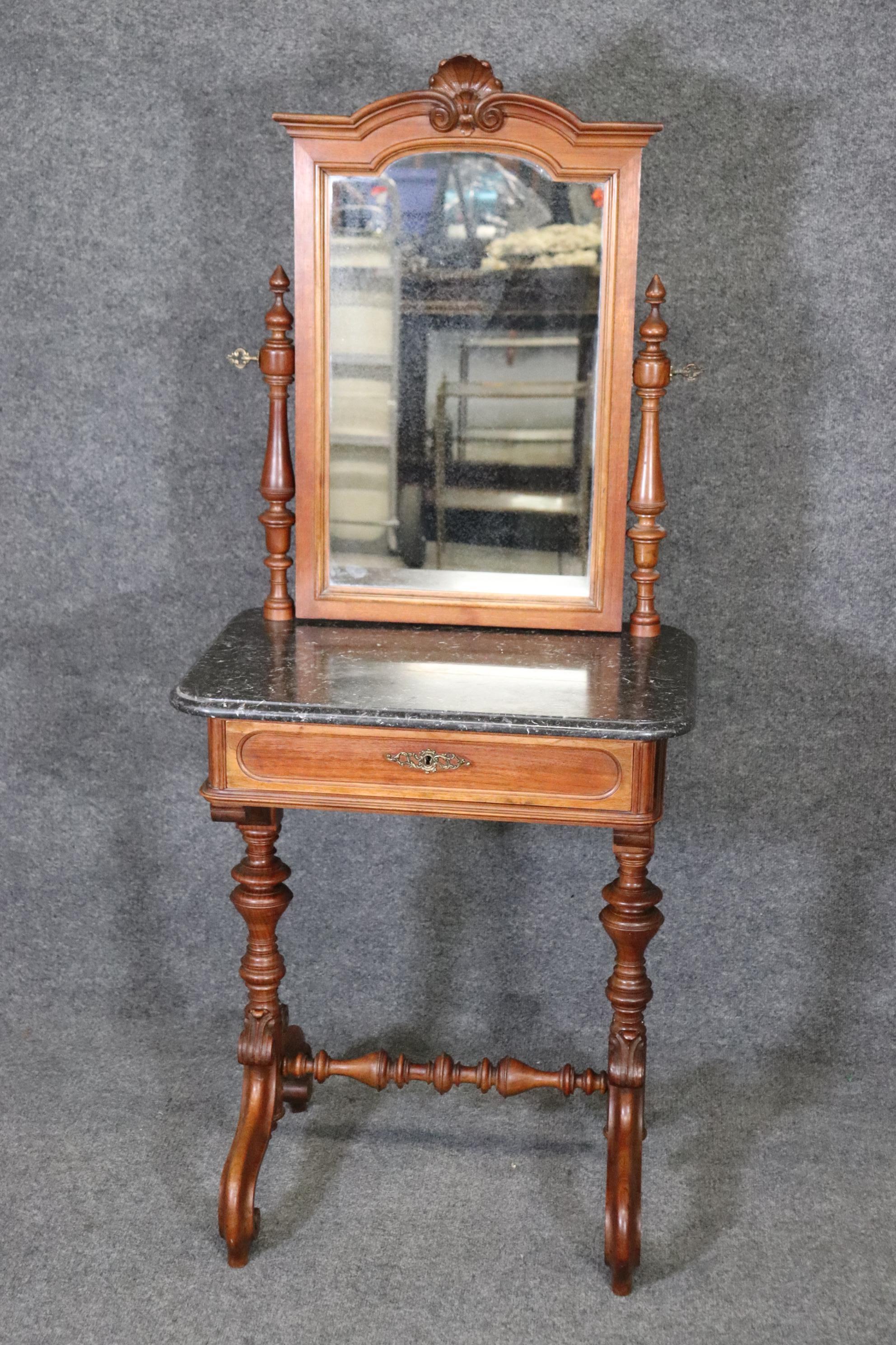 Dimensions- H: 57 1/2in W: 24 1/2in D: 18in.
This Antique Carved Victorian Marble Top Wash Stand Vanity is really unique and made of the highest quality woods and marble! If you take a look at the photos provided you will see the attention to