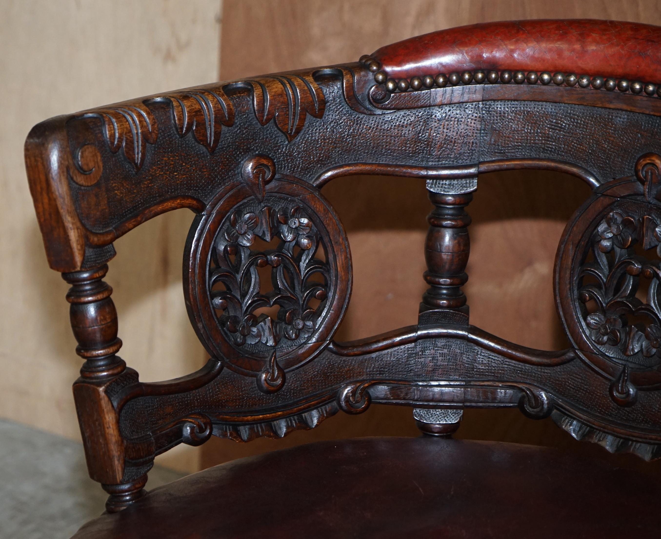 Hand-Crafted Antique Carved Victorian Oxblood Leather Burgermeister Chair 17th Century Design For Sale