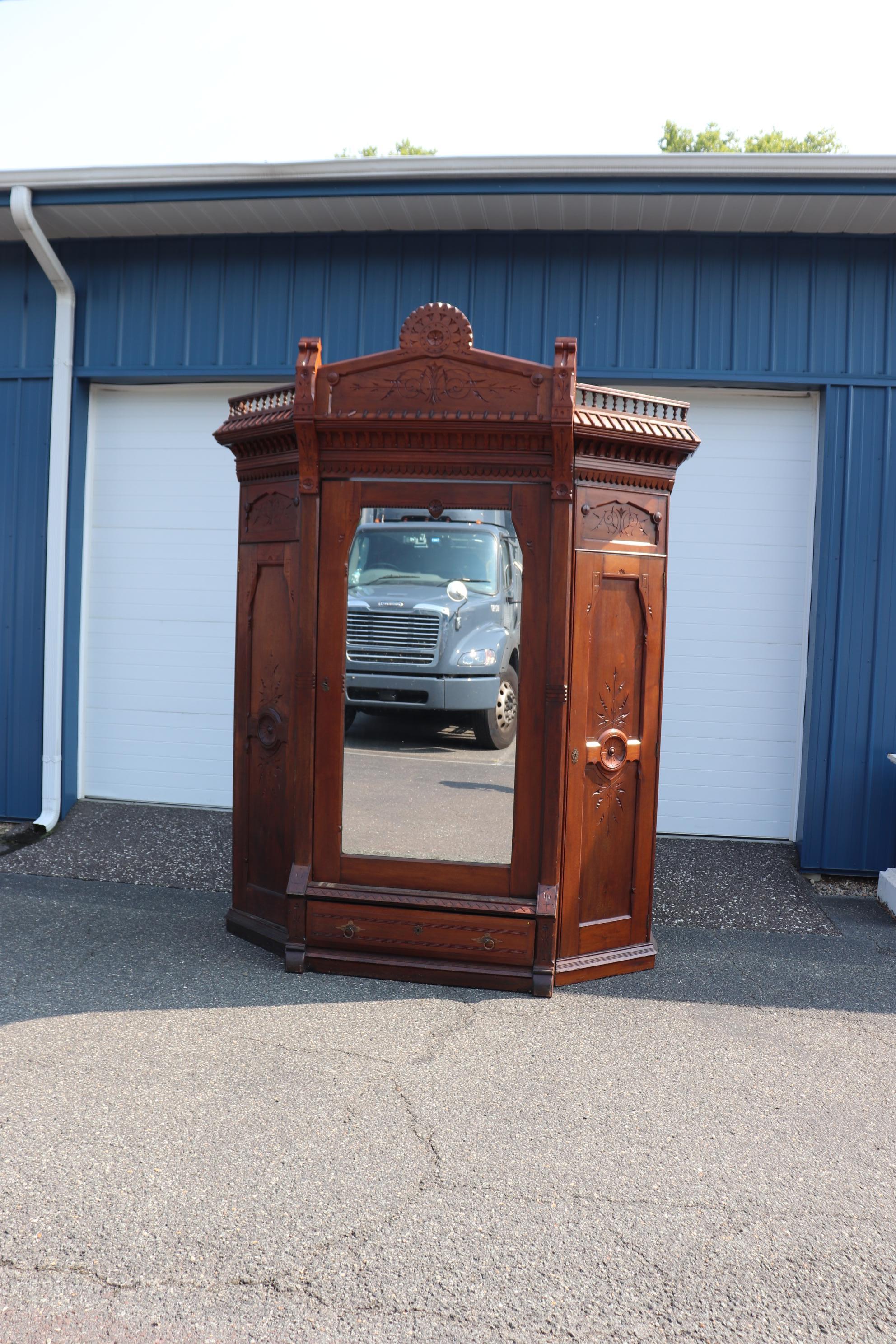 Renaissance Revival Antique Carved Walnut American Victorian Armoire Attributed to Daniel Pabst For Sale