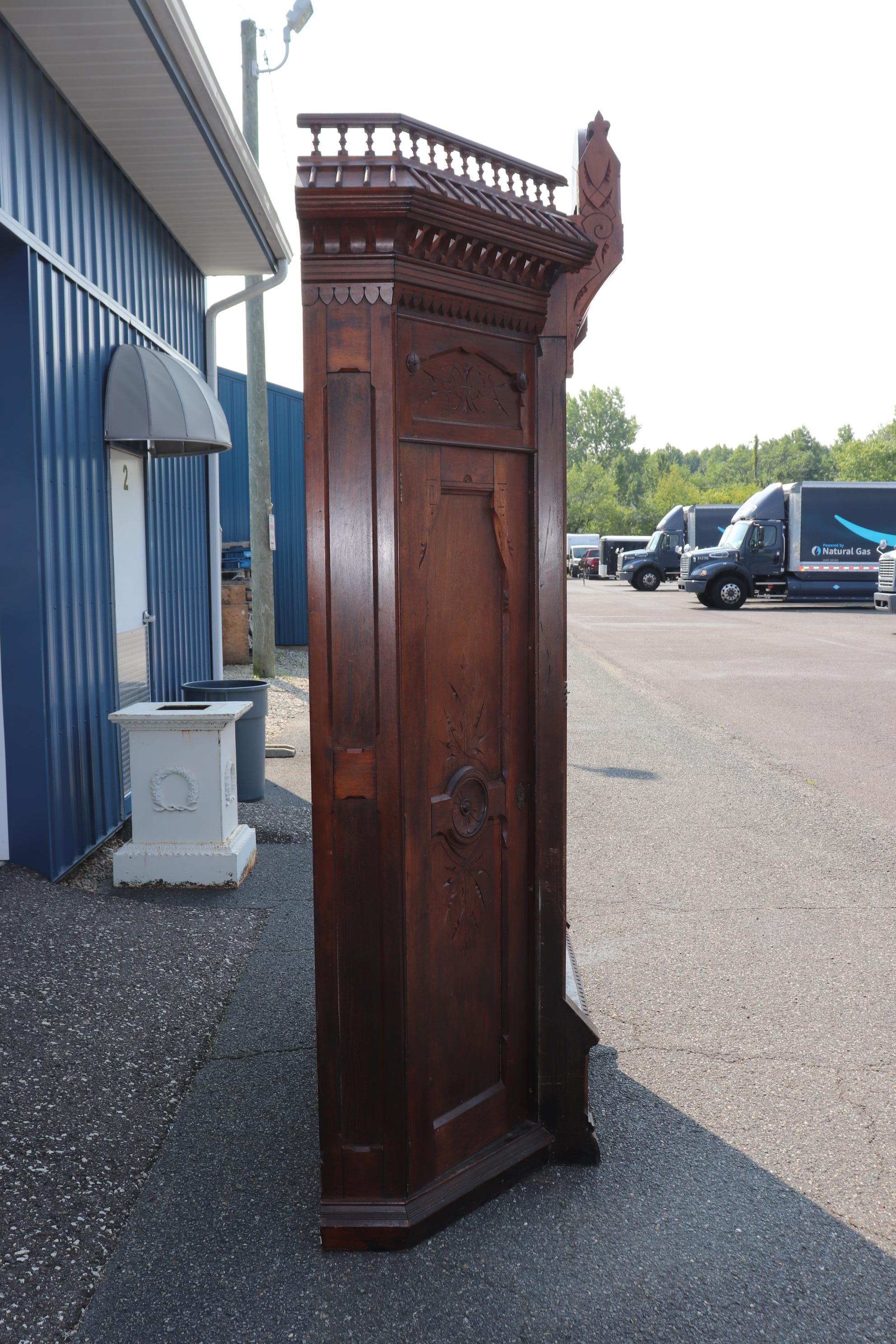 Late 19th Century Antique Carved Walnut American Victorian Armoire Attributed to Daniel Pabst For Sale