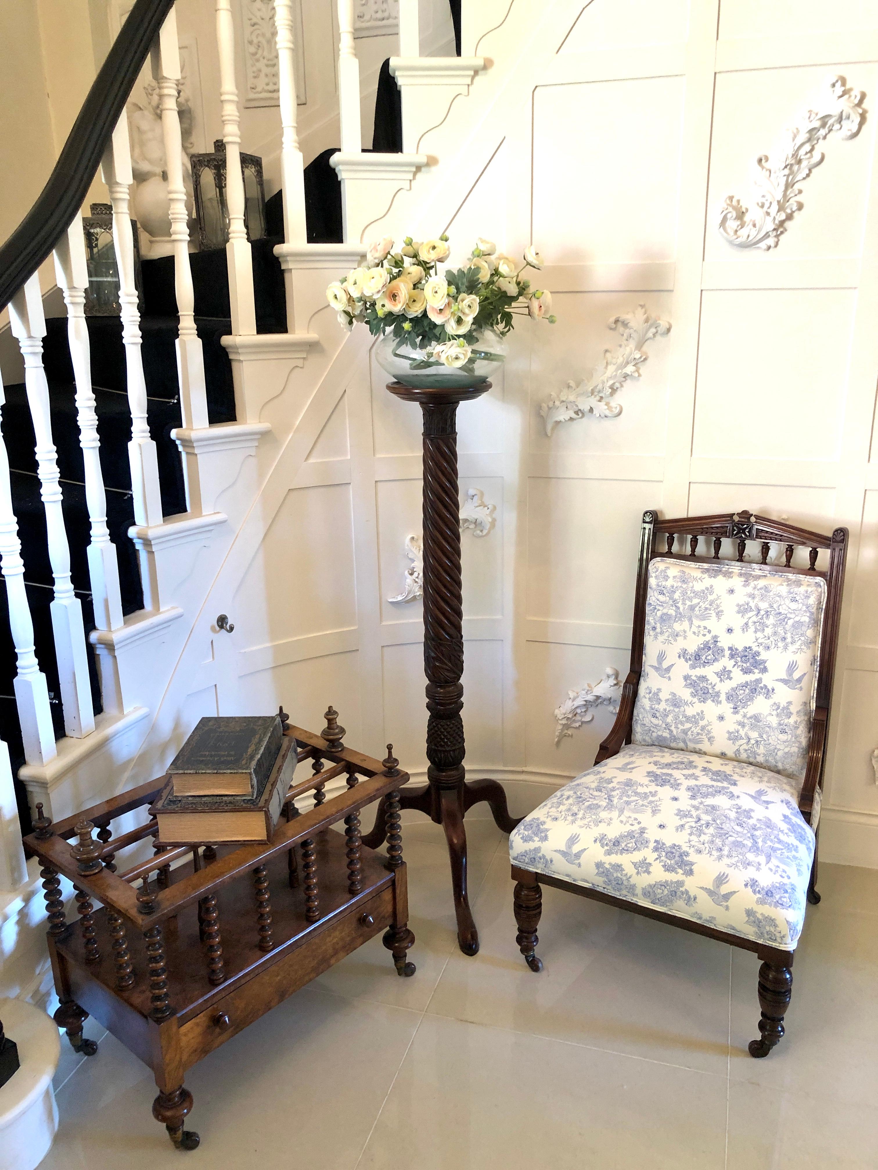 Antique carved walnut ladies chair having a quality carved walnut shaped top rail with two shaped walnut side supports. It stands on turned tapering legs to the front and out swept back legs with original castors. It has been newly upholstered in a