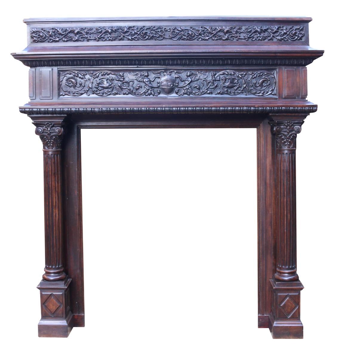 An impressive Renaissance style fire surround with carved frieze above Corinthian capital columns.

Opening Height 149.5 cm

Opening Width 129.5 cm

Width Between Outside of Legs 189 cm.