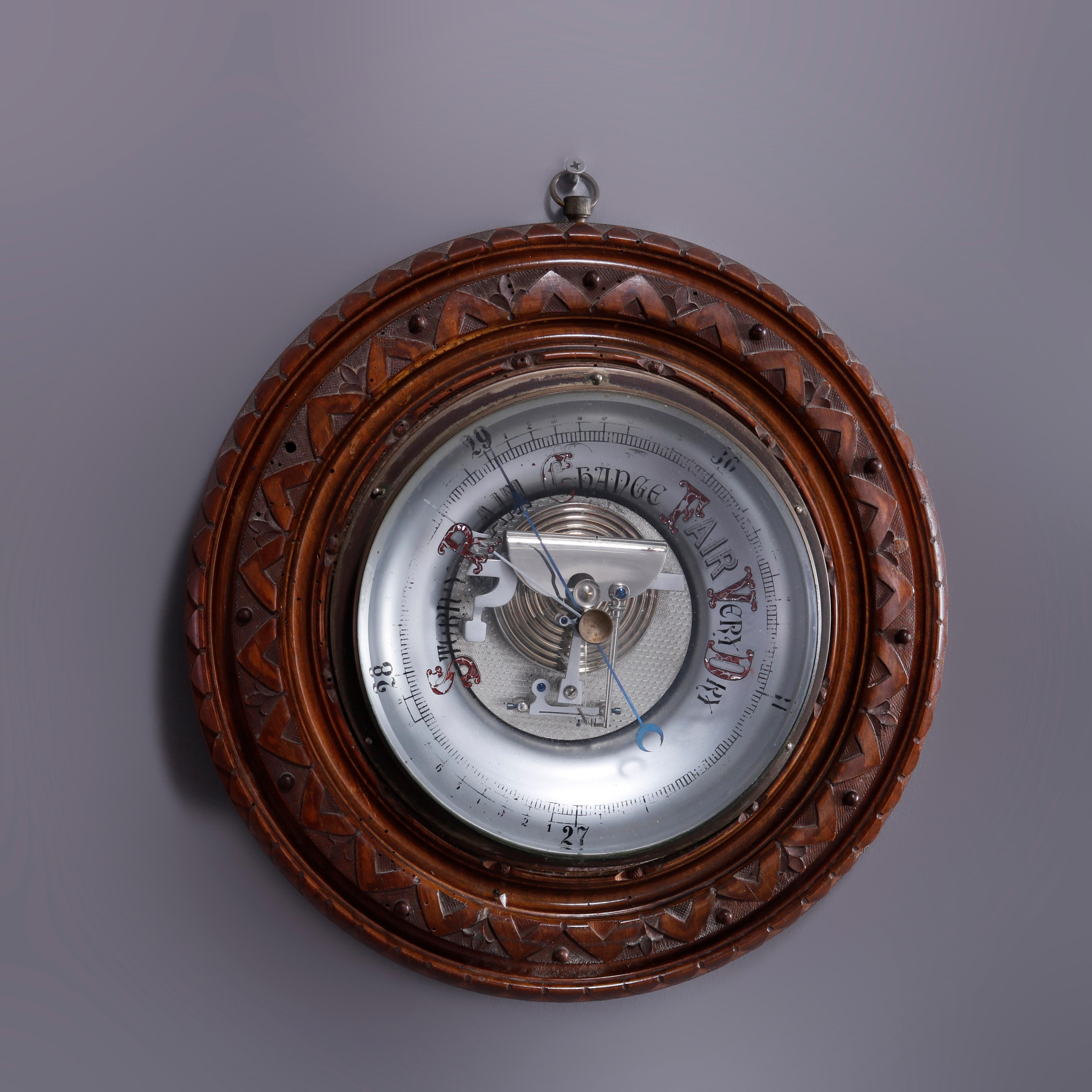 An antique wall barometer offers walnut frame with carved stylized foliate elements, c1890

Measures: 14