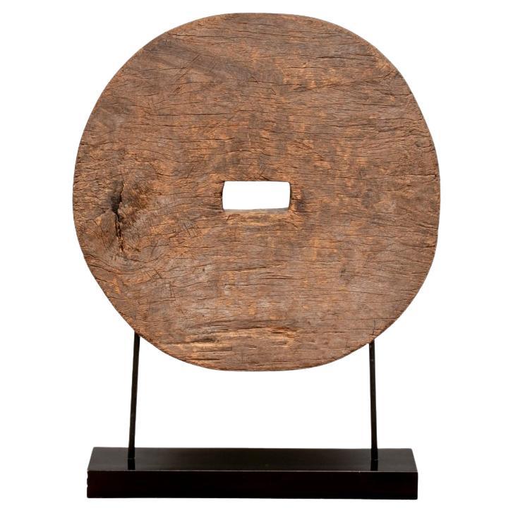 Antique Carved Wheel Mounted On Stand