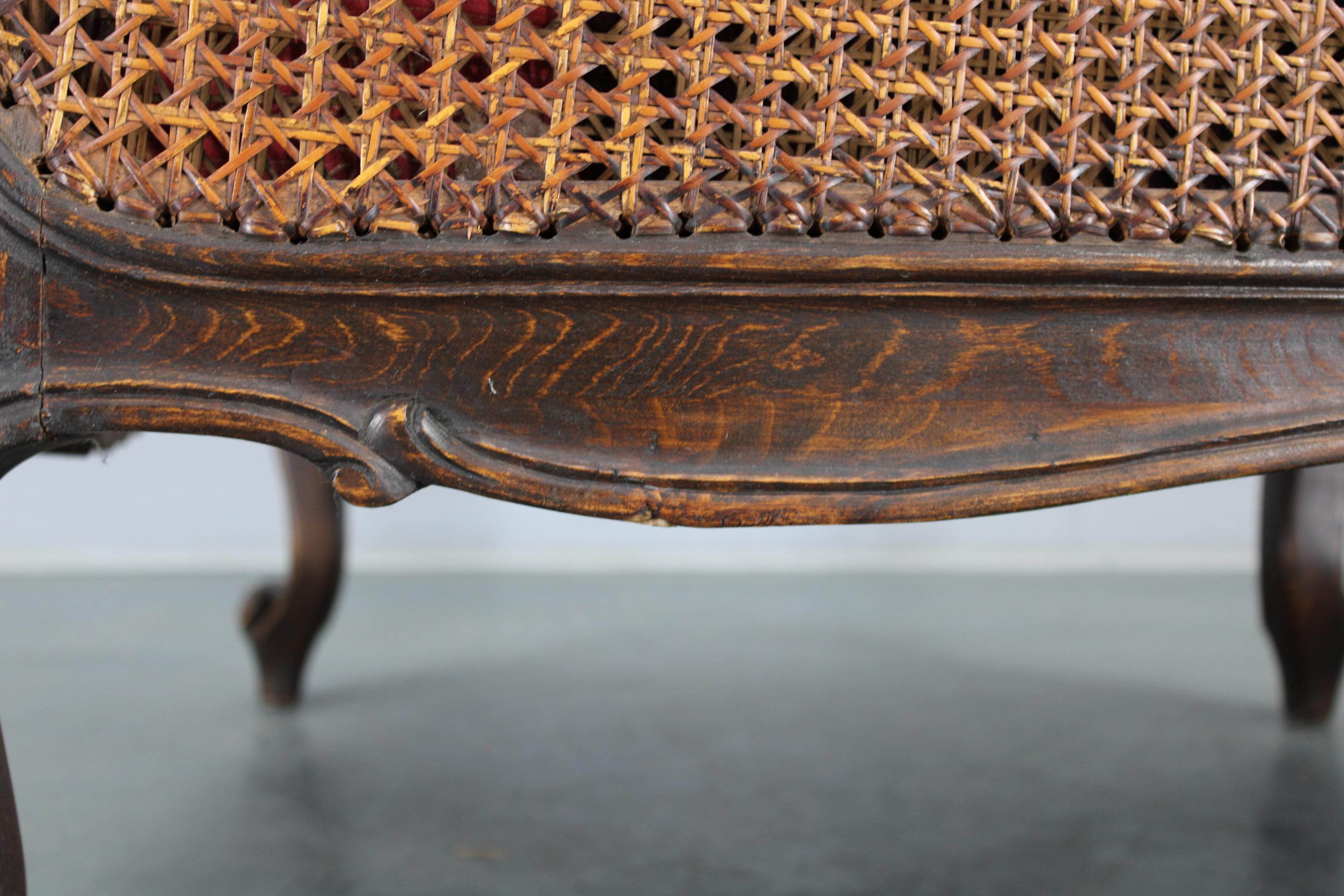 Antique Carved Wing Chair with Cane Sides , Czechoslovakia For Sale 12