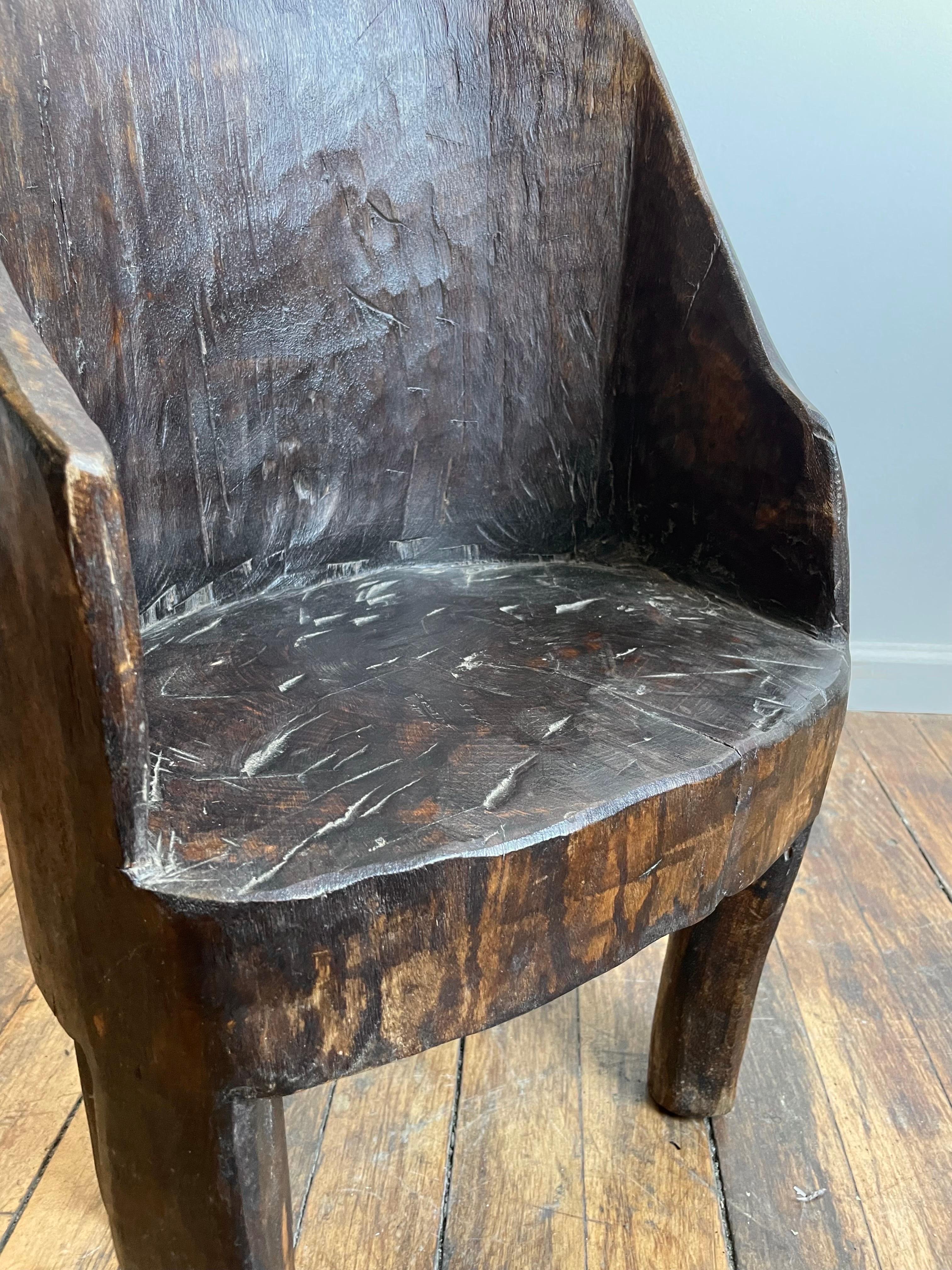 Beautiful carved wood chair with low seat. 

Believed to be 120-150 years old. 