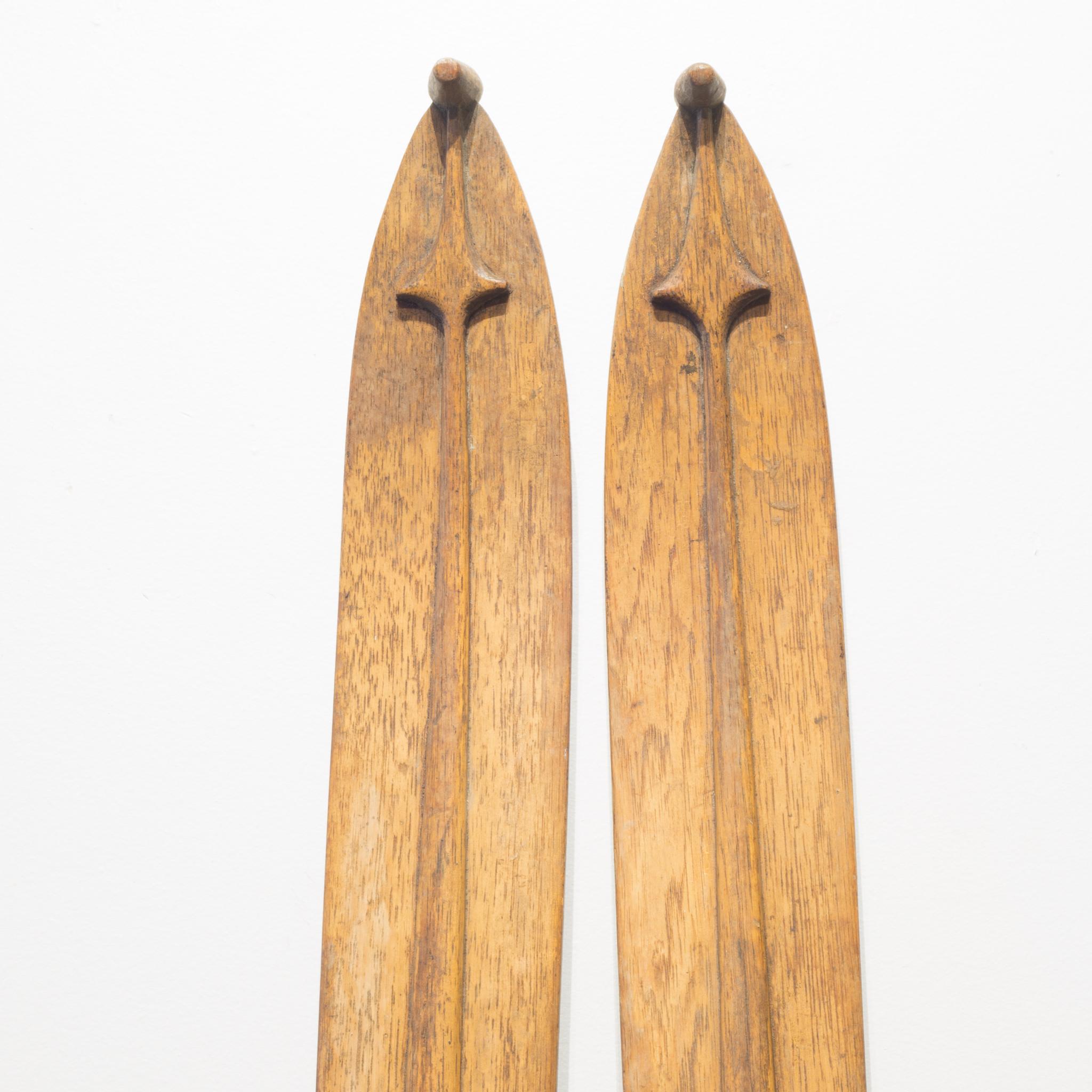 American Antique Carved Wood and Leather Skiis, circa 1930