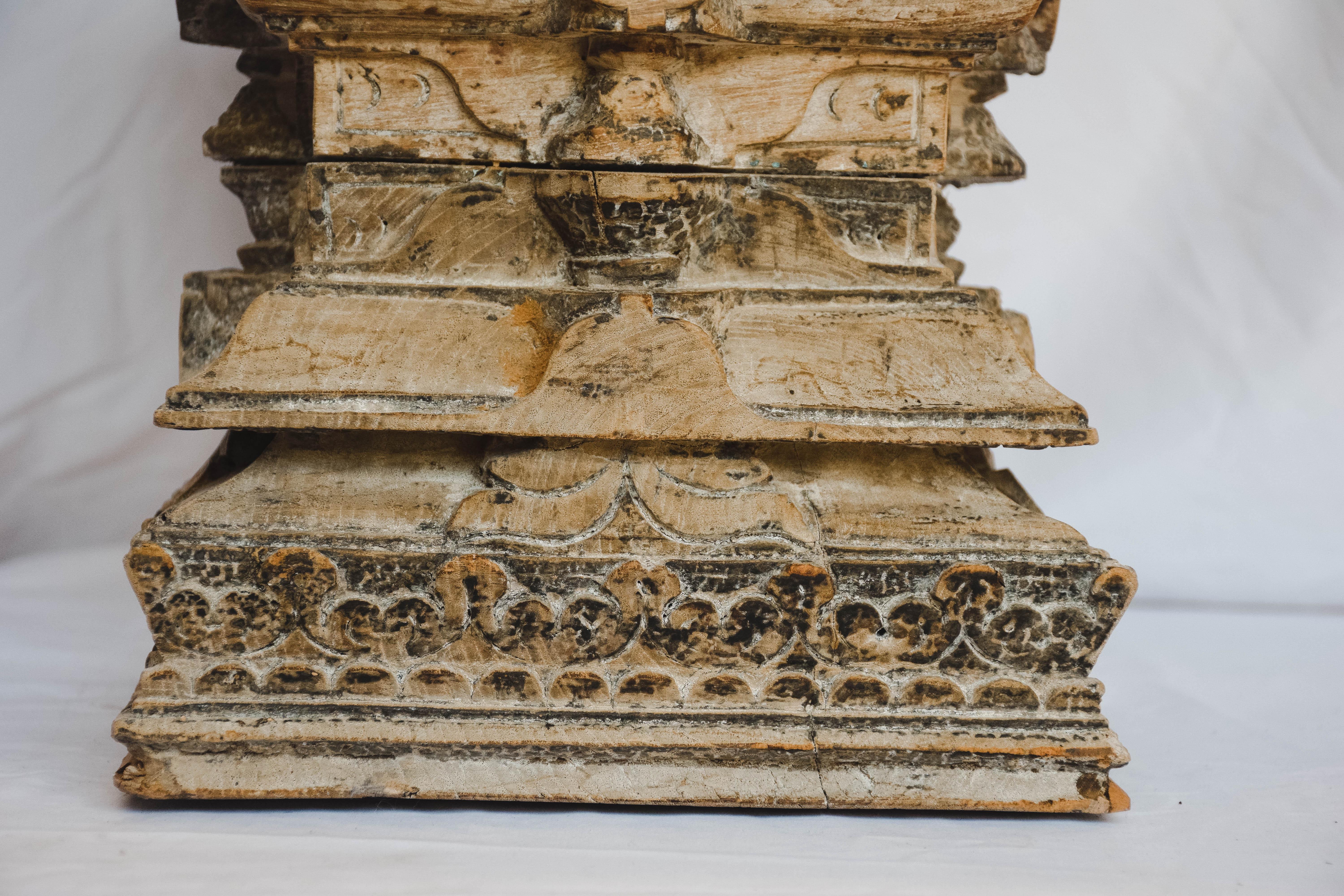 This antique wood column capital or pilaster is wonderfully hand carved and very decorative. Would be beautiful alone or great used as a riser or pedestal with candles or to display other decorative objects.