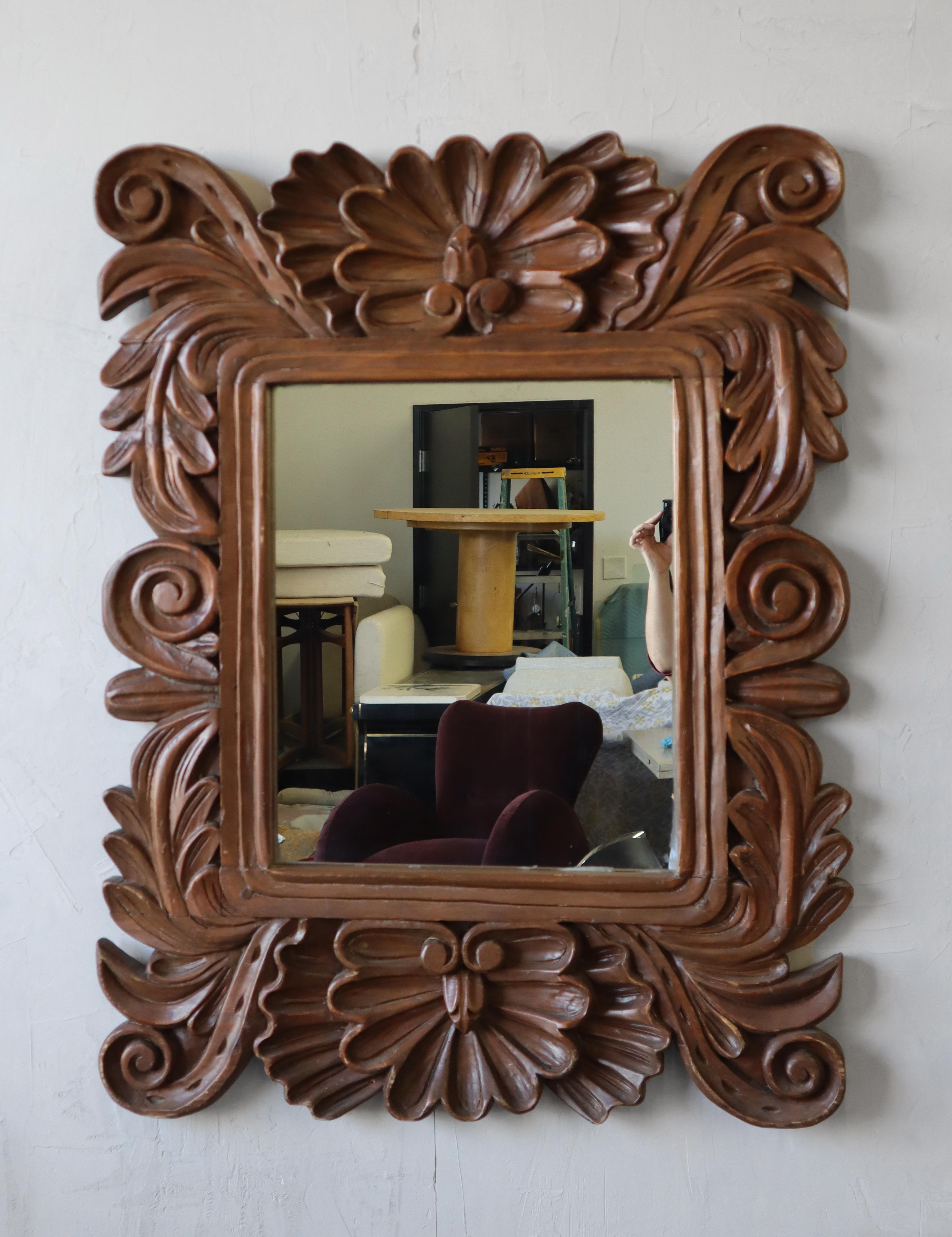 Large and beautiful antique, hand carved wood, filigree wall mirror. Super hand made details and patina, the depth of the carvings really create the most beautiful shadows.

Mirror and frame are in excellent antique condition.