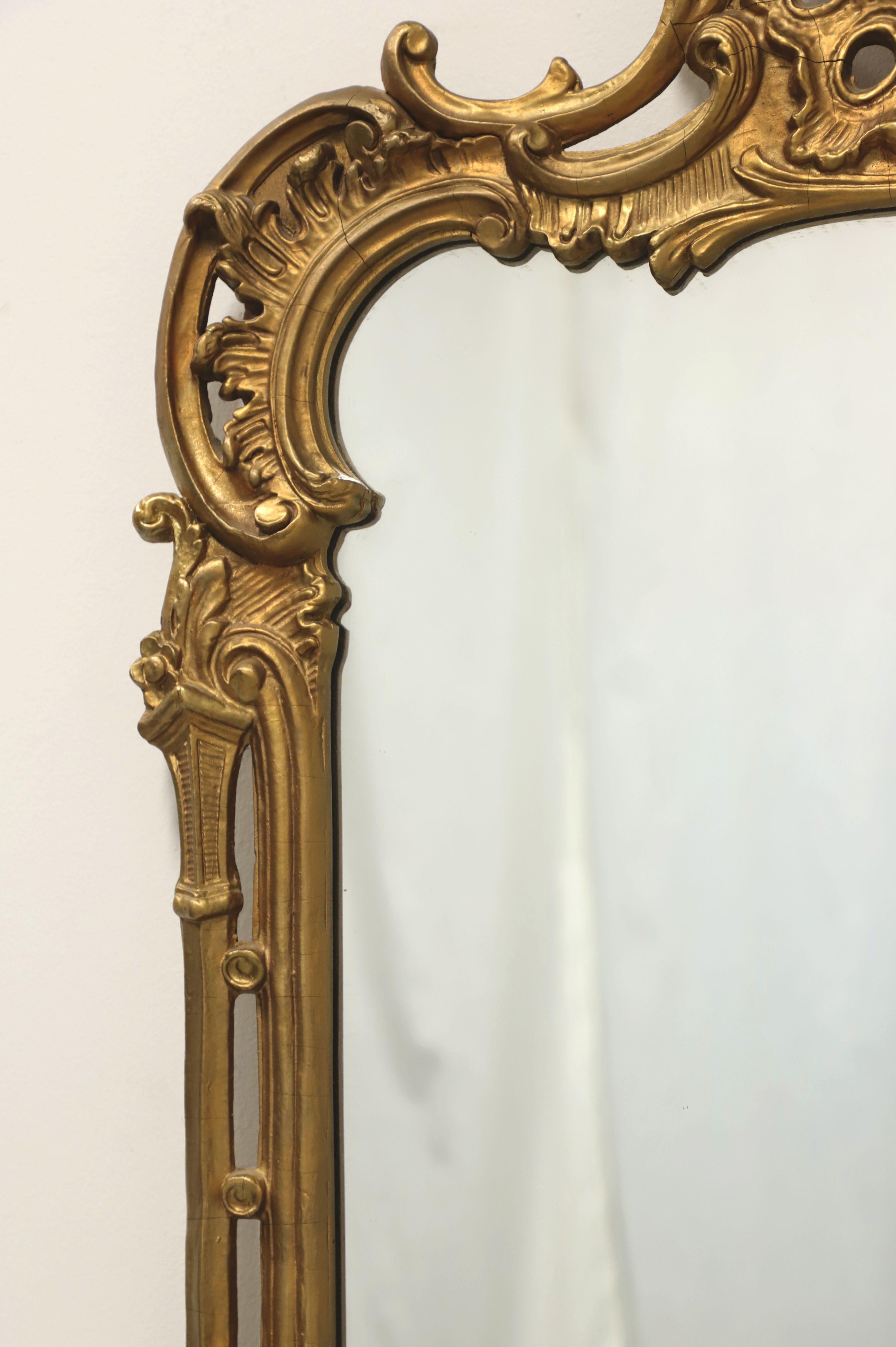 ornate carved wood mirror