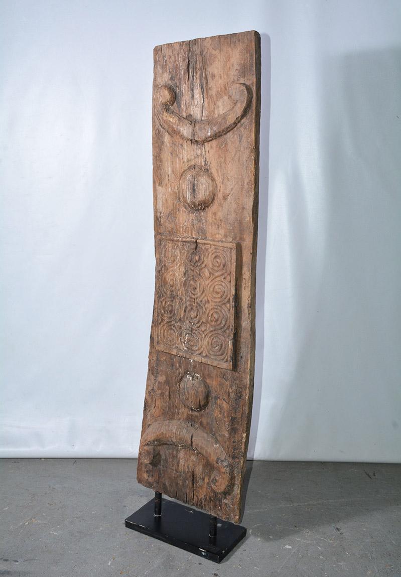 Exotic 19th century carved relief architectural wood element, once part of a building facade has now been mounted on metal stand and made into an exciting and impressive sculpture.
Dimensions: Wood carving 48.75 x 12.75 / OAH=52