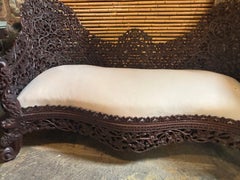 Sofá-cama de madera tallada antigua de la India