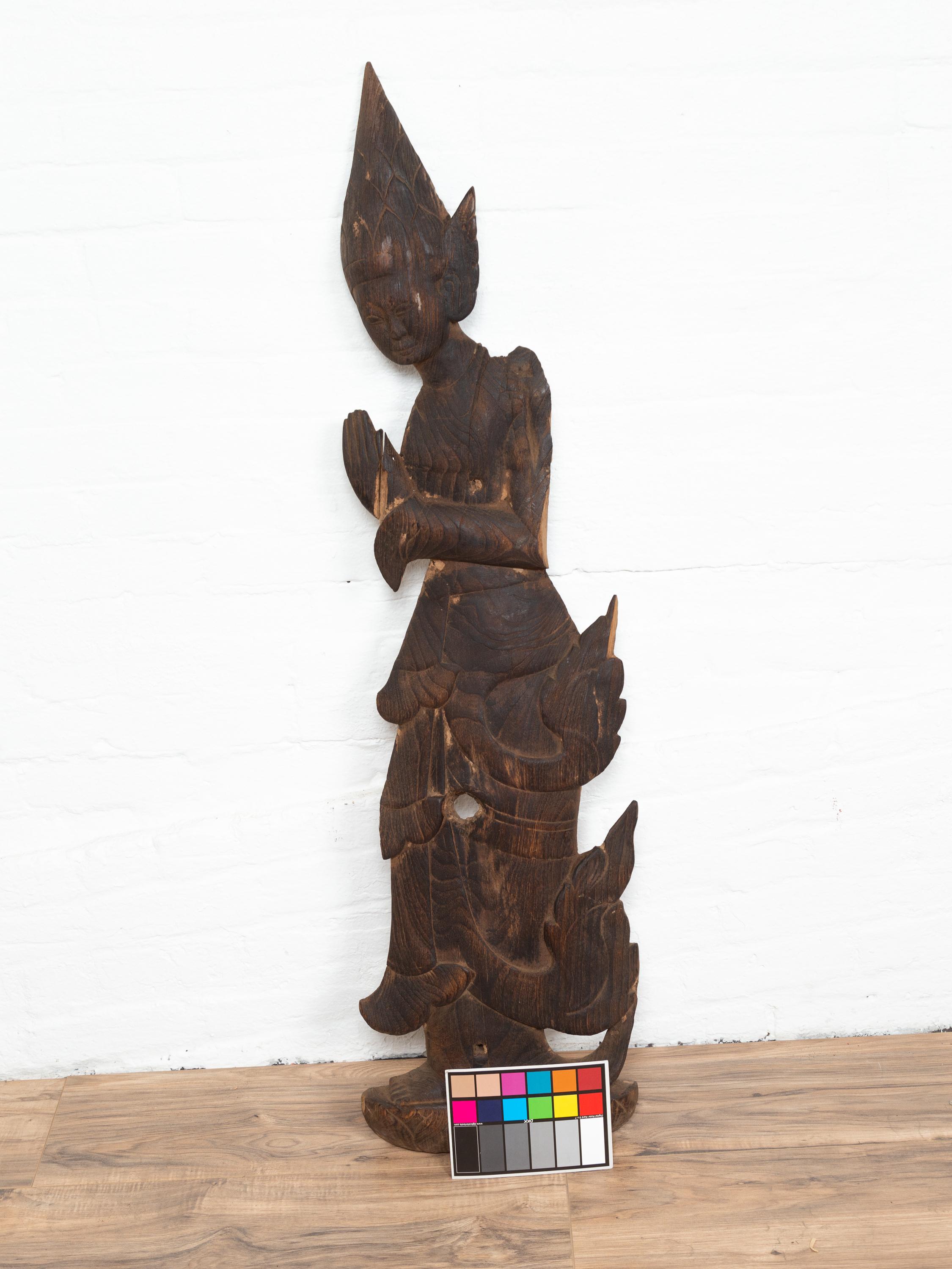 Carved Thai Wooden Sculpture of a Praying Apsara with Dark Brown Patina For Sale 7