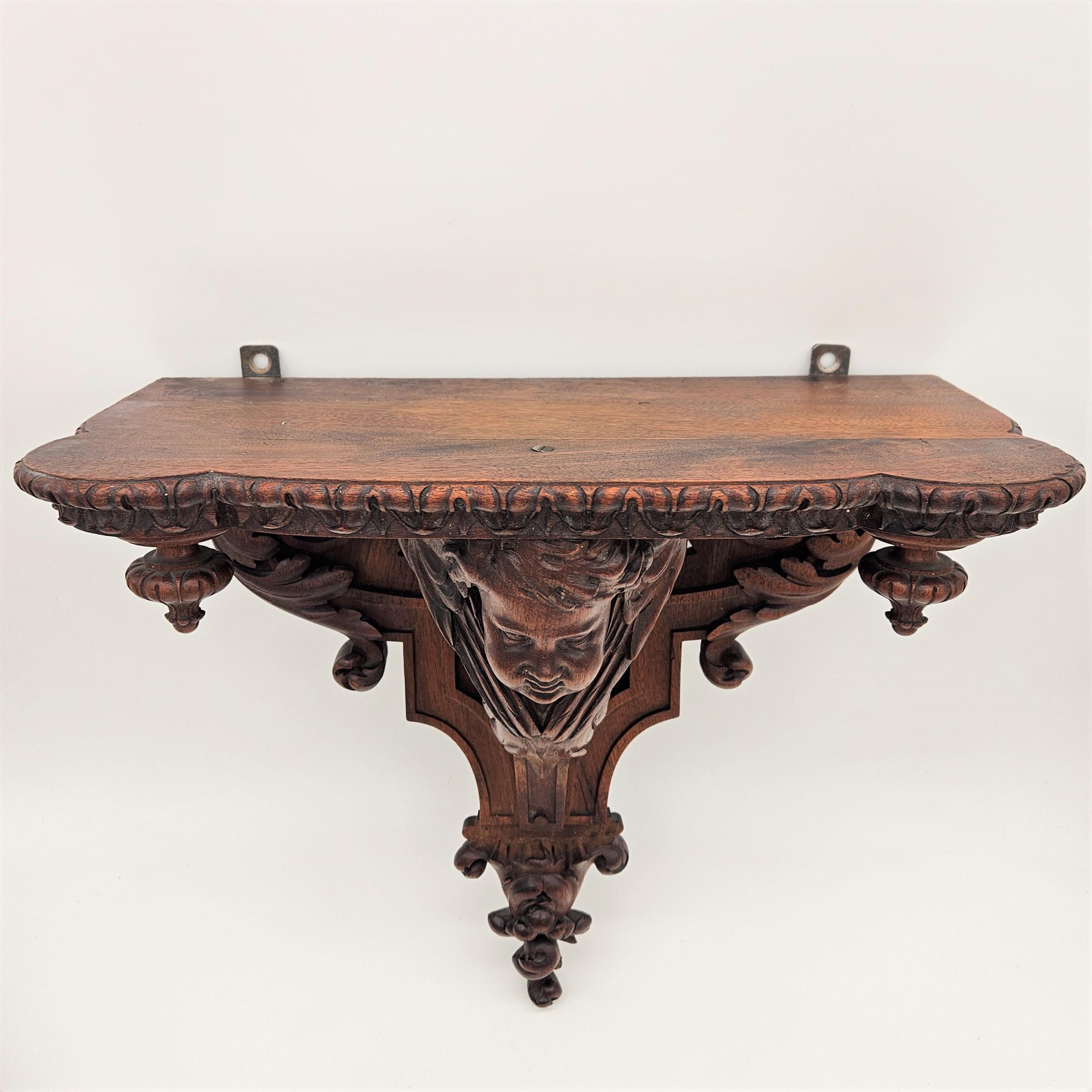 Hand-Carved Antique Carved Wooden Wall Console with Angel. 1850 - 1880 For Sale