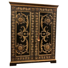 Armoire ancienne en bois sculpté, laquée noire et or, 19ème siècle, Italie