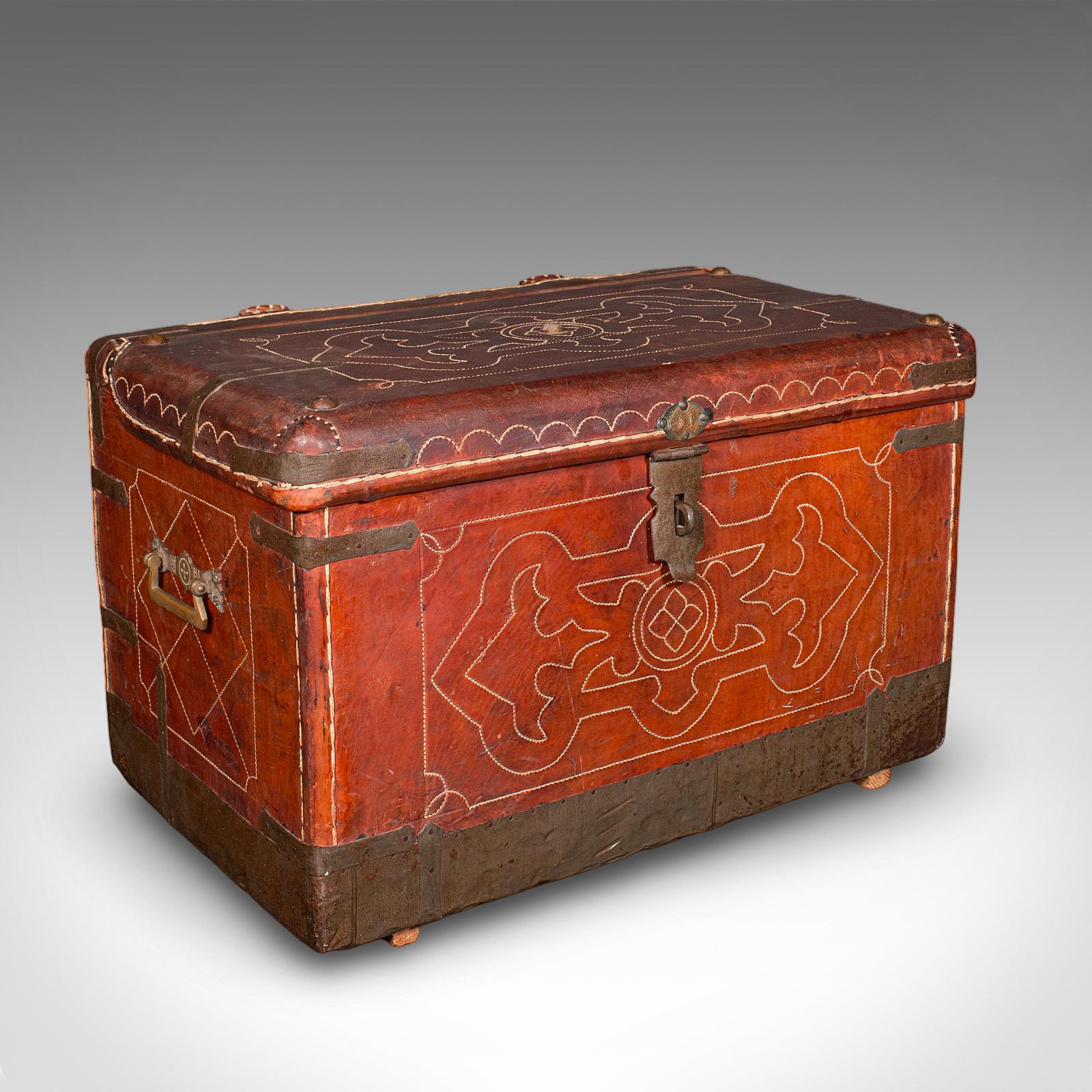 This is an antique Casablanca travel trunk. A North African, leather portmanteau case dating to the Edwardian period, circa 1910. A charming and tactile example, rich in colour and decorative appeal.

Delightful Edwardian travel trunk of North