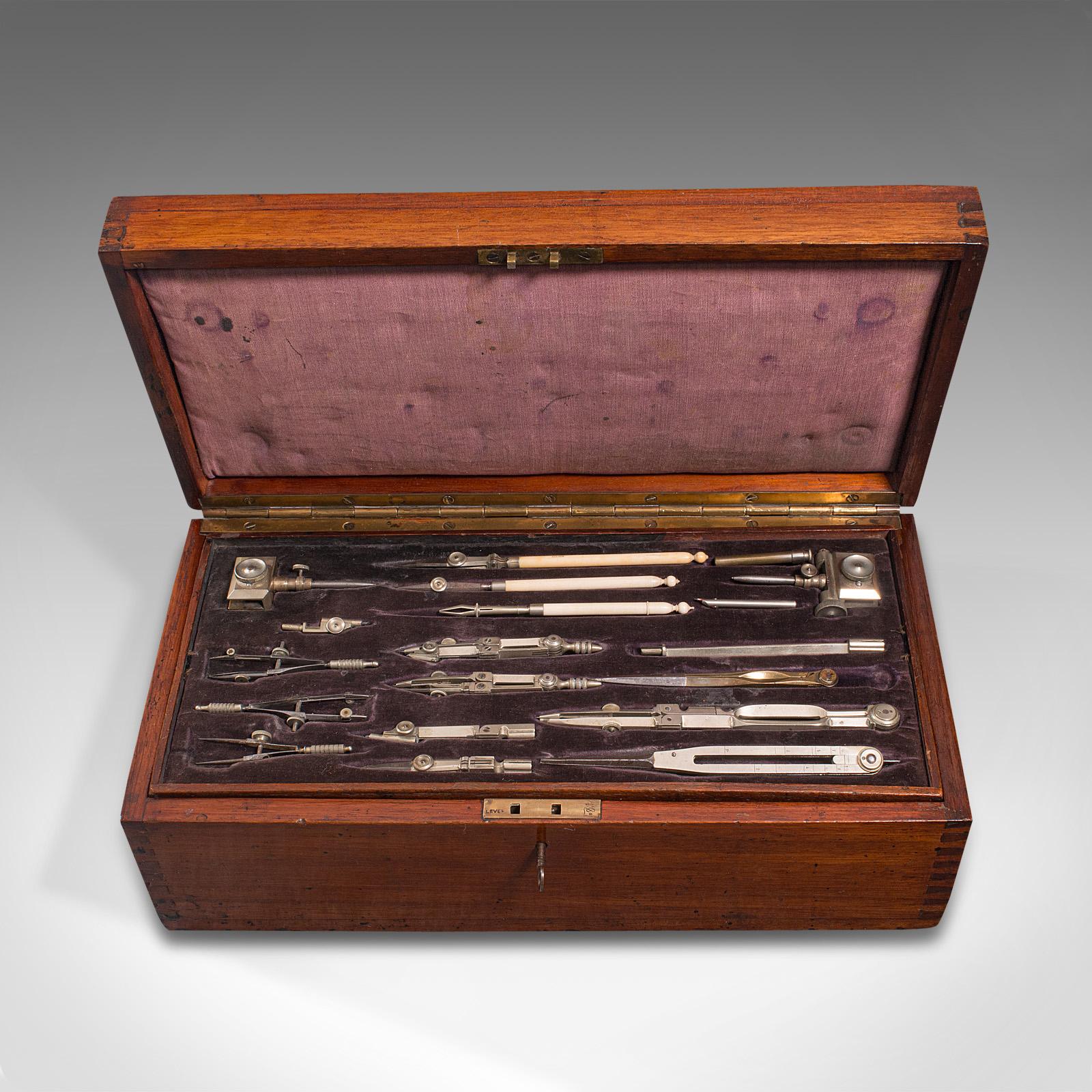 This is an antique cased draughtsman's set. An English, desktop collection of silver nickel, celluloid and brass drawing tools, dating to the Edwardian period, circa 1910.

Delightfully presented instruments for the master draughtsman
Displaying