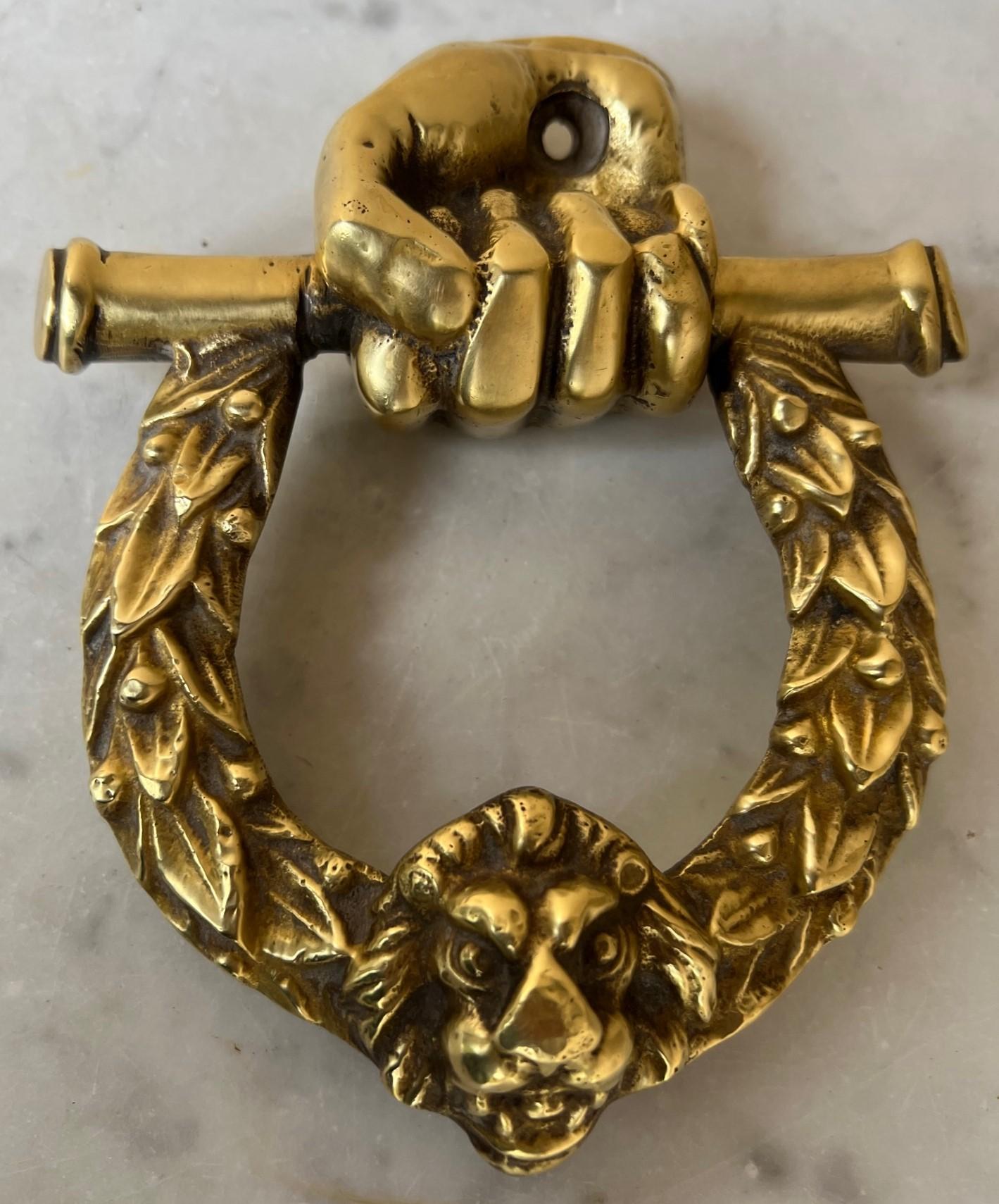 European Antique Cast Brass Lion Wreath Door Knocker For Sale