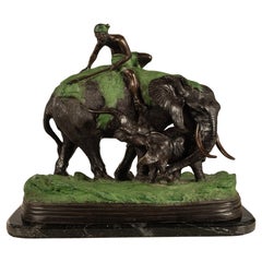 Scène de chasse à l'éléphant et au lion en bronze moulé Antonio Amorgasti Belgique 1925