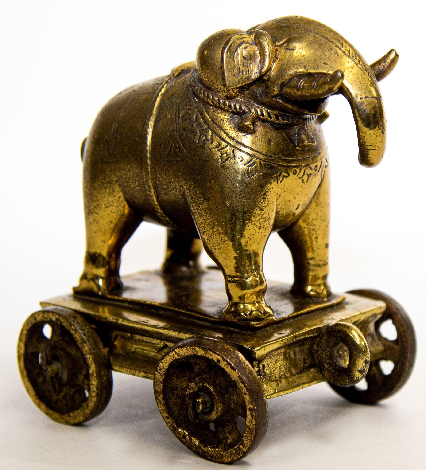 Antique Cast Bronze Elephant Temple Toy on Wheels 1