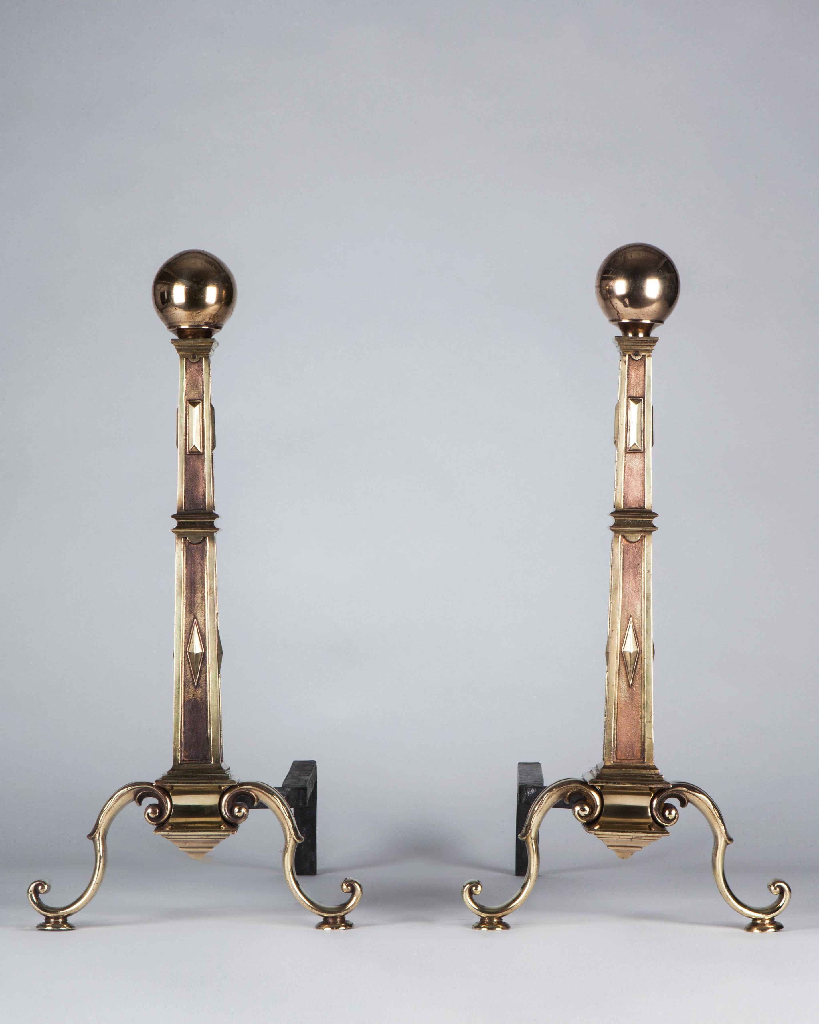 AFP0607

A pair of antique cast bronze andirons in their original age-darkened finish, circa 1920s. With finely modeled tapered square columns topped by ball finials, set on cove bases and S-scroll feet. Sharp details and thoughtful proportions mark