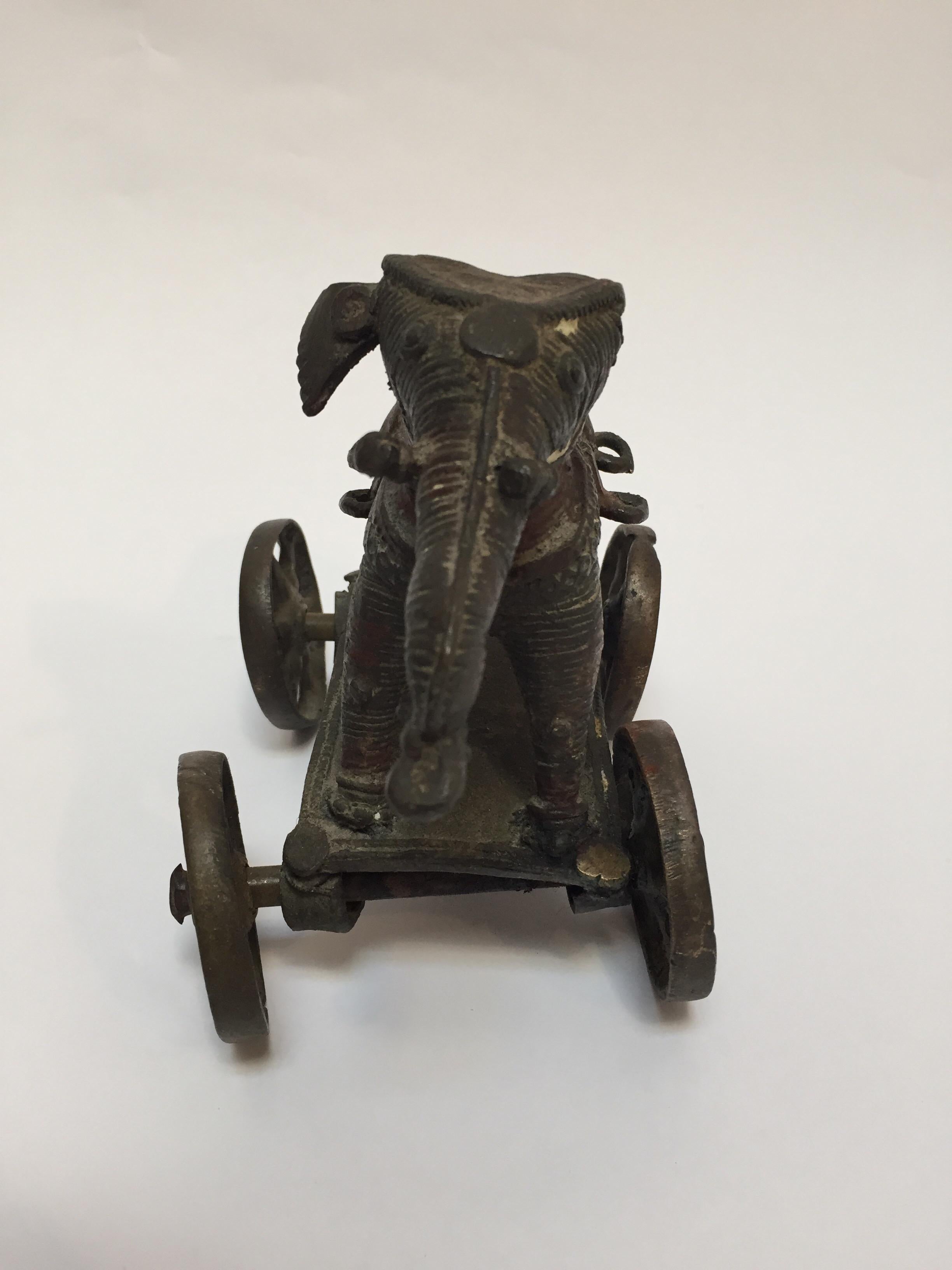 Antique Cast Bronze Temple Toy Elephant on Wheels India In Fair Condition In North Hollywood, CA