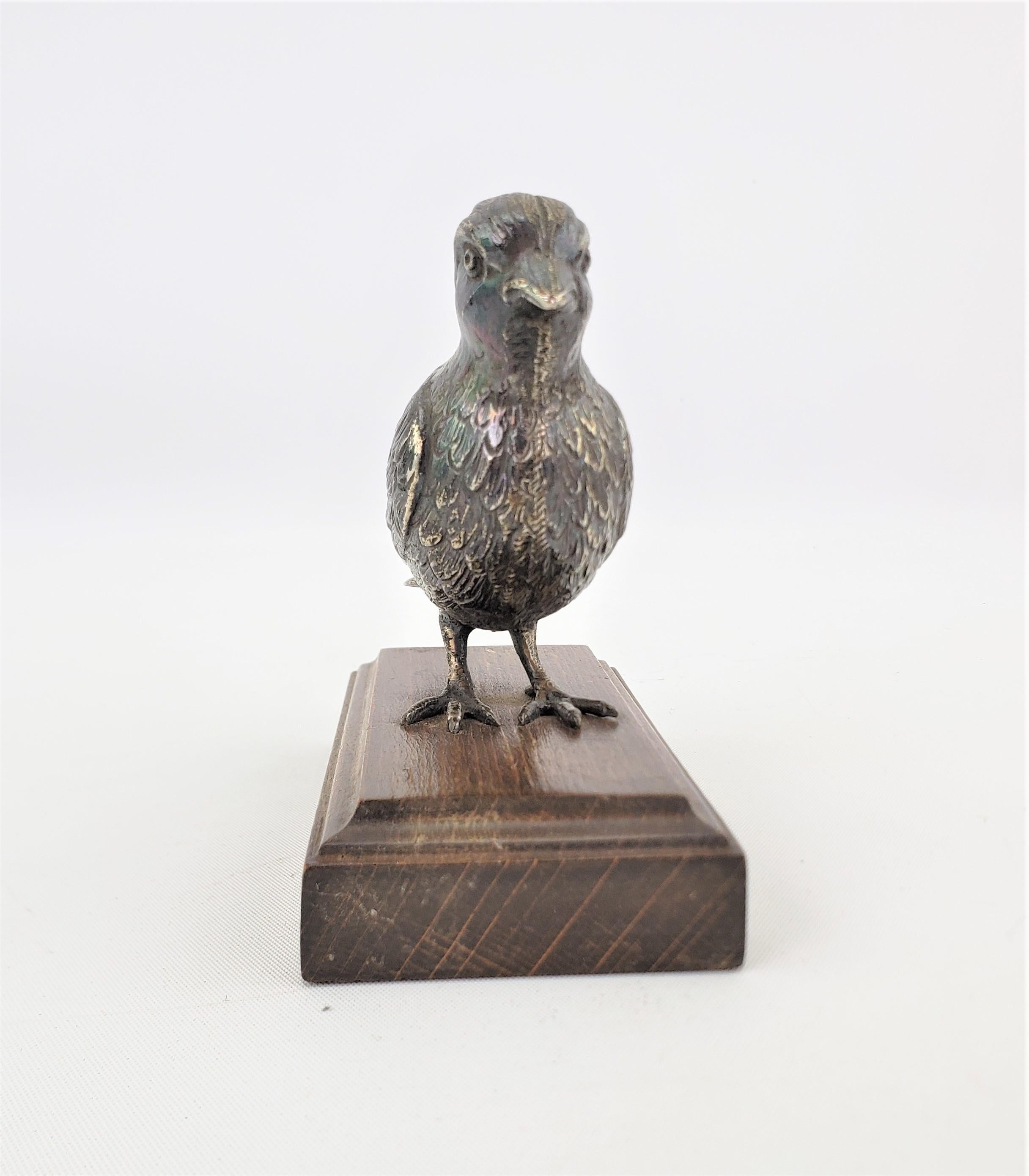 Art Deco Antique Cast Continental Silver Bird Sculpture on a Wooden Base For Sale