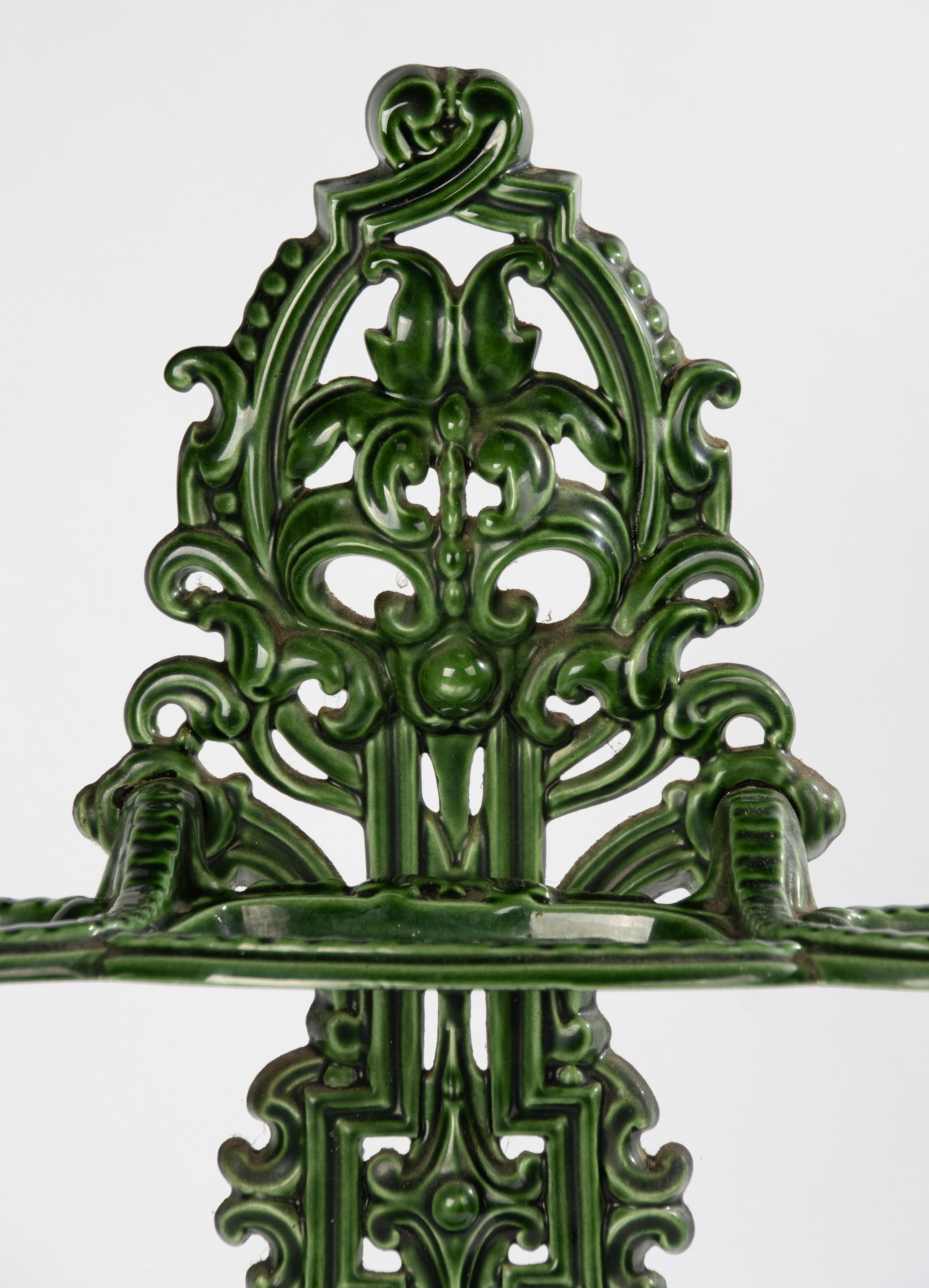 An elegant umbrella stand, made of enameled cast iron. Made in France, circa 1910-1920. In good condition. The stand can be dismantled for safe transport. 

Dimensions: 62,5(h) x 55 x 18 cm
Free shipping worldwide