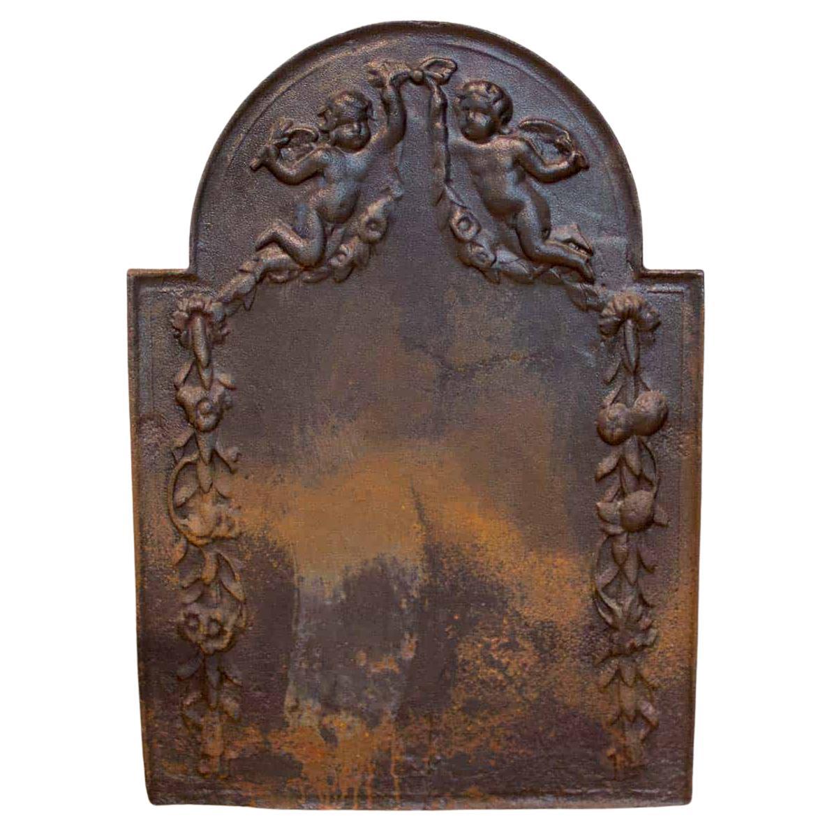 Antico parafuoco in ghisa "Allegoria della Pace