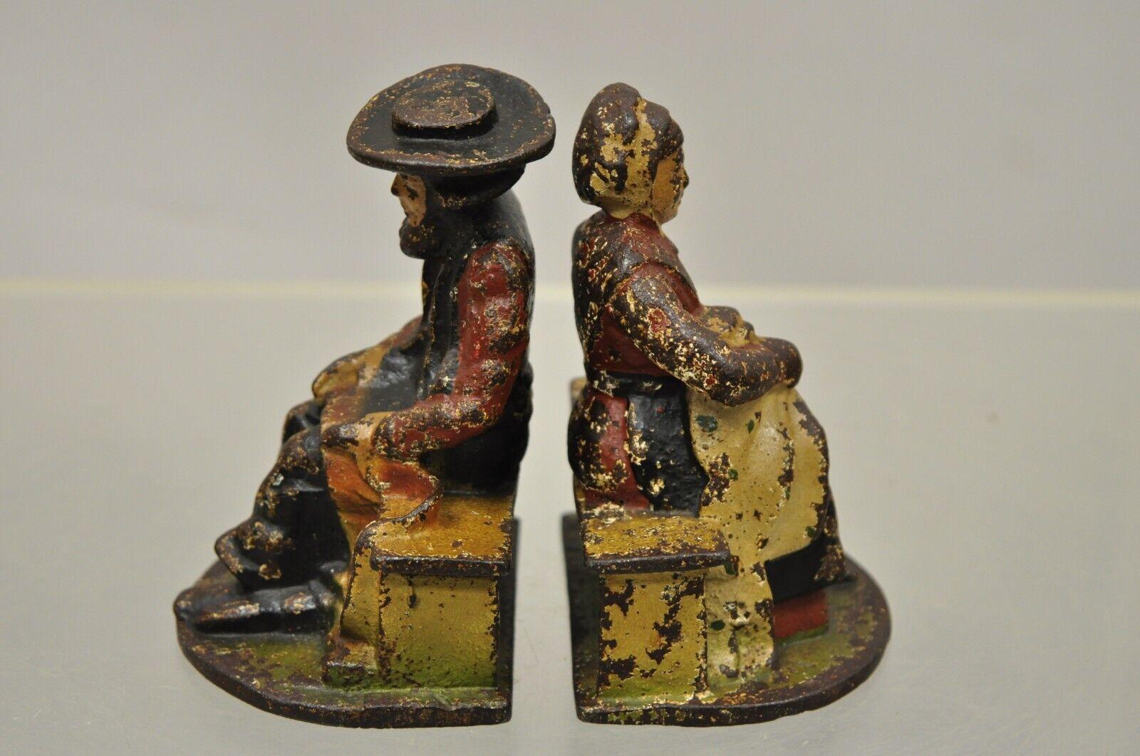 Antique Cast Iron Amish Man and Woman Couple Bookends, a Pair In Good Condition For Sale In Philadelphia, PA