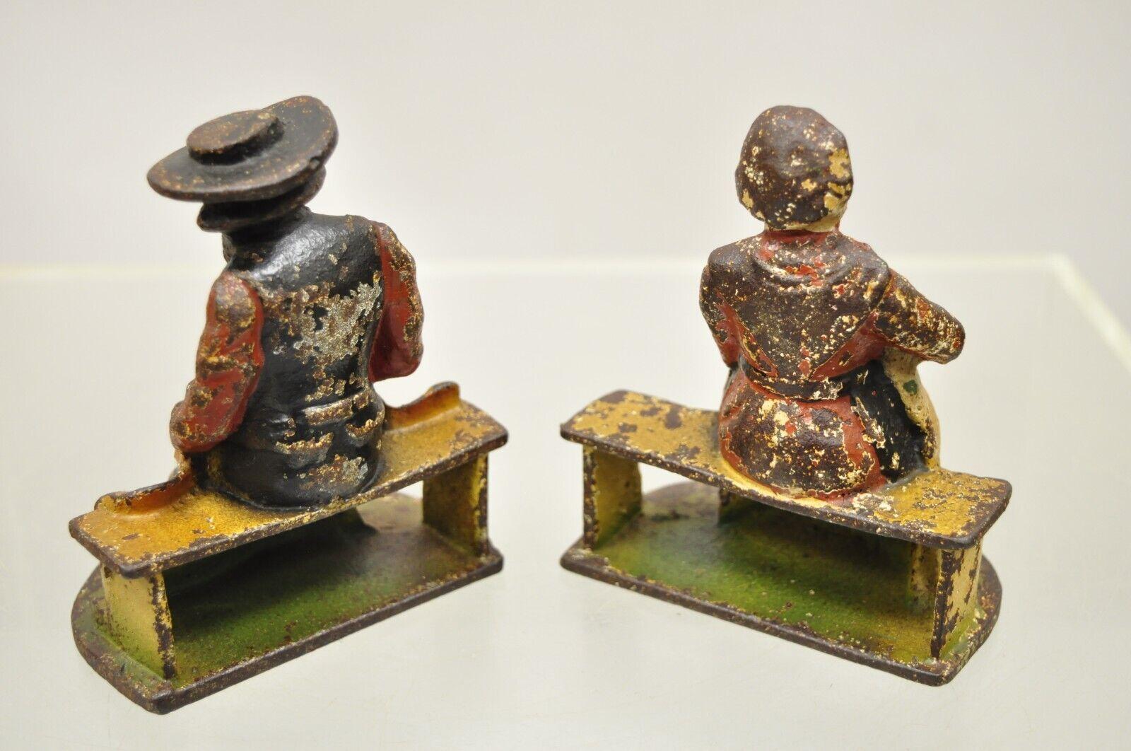 20th Century Antique Cast Iron Amish Man and Woman Couple Bookends, a Pair