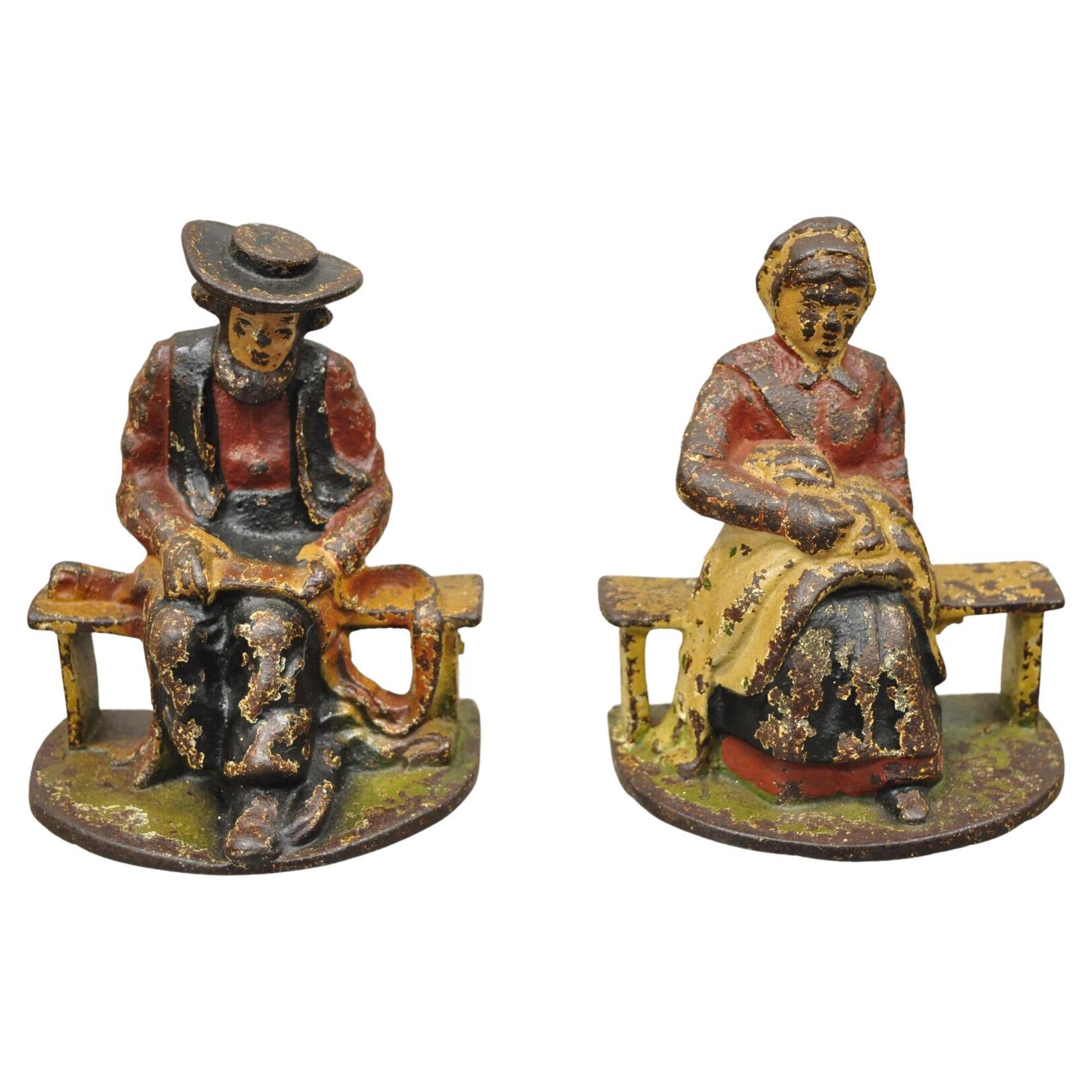 Antique Cast Iron Amish Man and Woman Couple Bookends, a Pair For Sale
