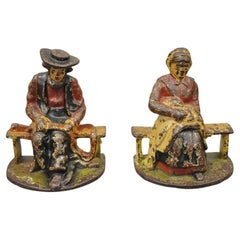 Antique Cast Iron Amish Man and Woman Couple Bookends, a Pair