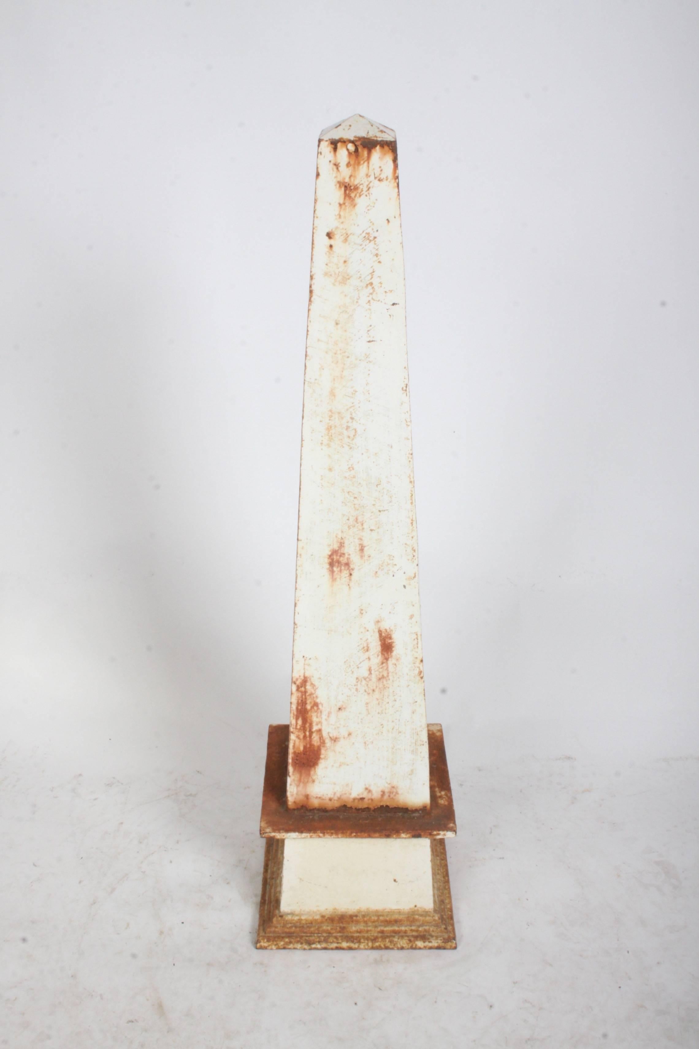 Late 19th c. or early 20th c. cast iron architectural garden obelisk. Nice decorative item for any garden or home. 