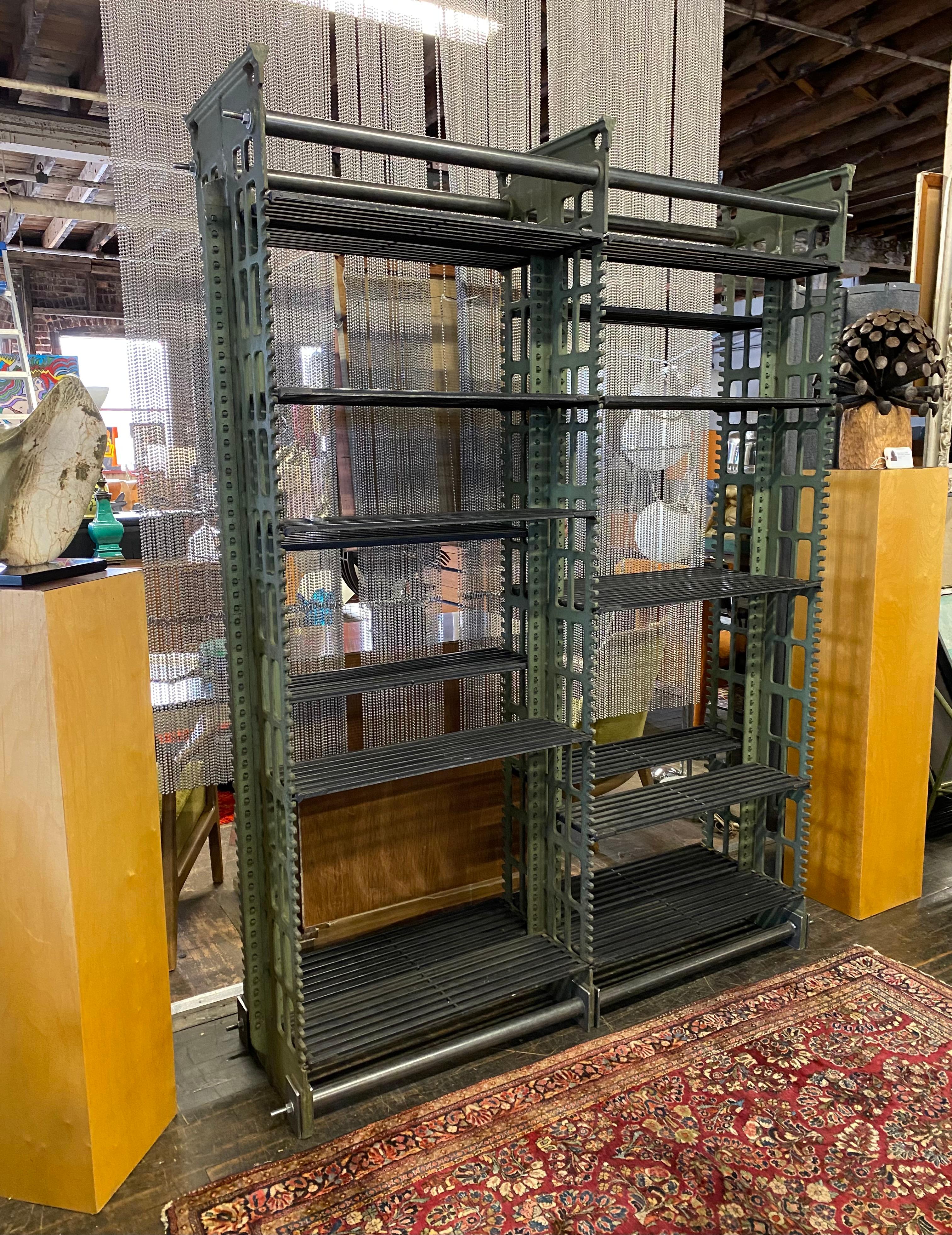 A rare set of antique cast iron archival library bookcases by Snead. these impressive cast iron bookcases with adjustable steel shelves were the standard in the late 19th and early 20th century for library and archival storage, and were used by the
