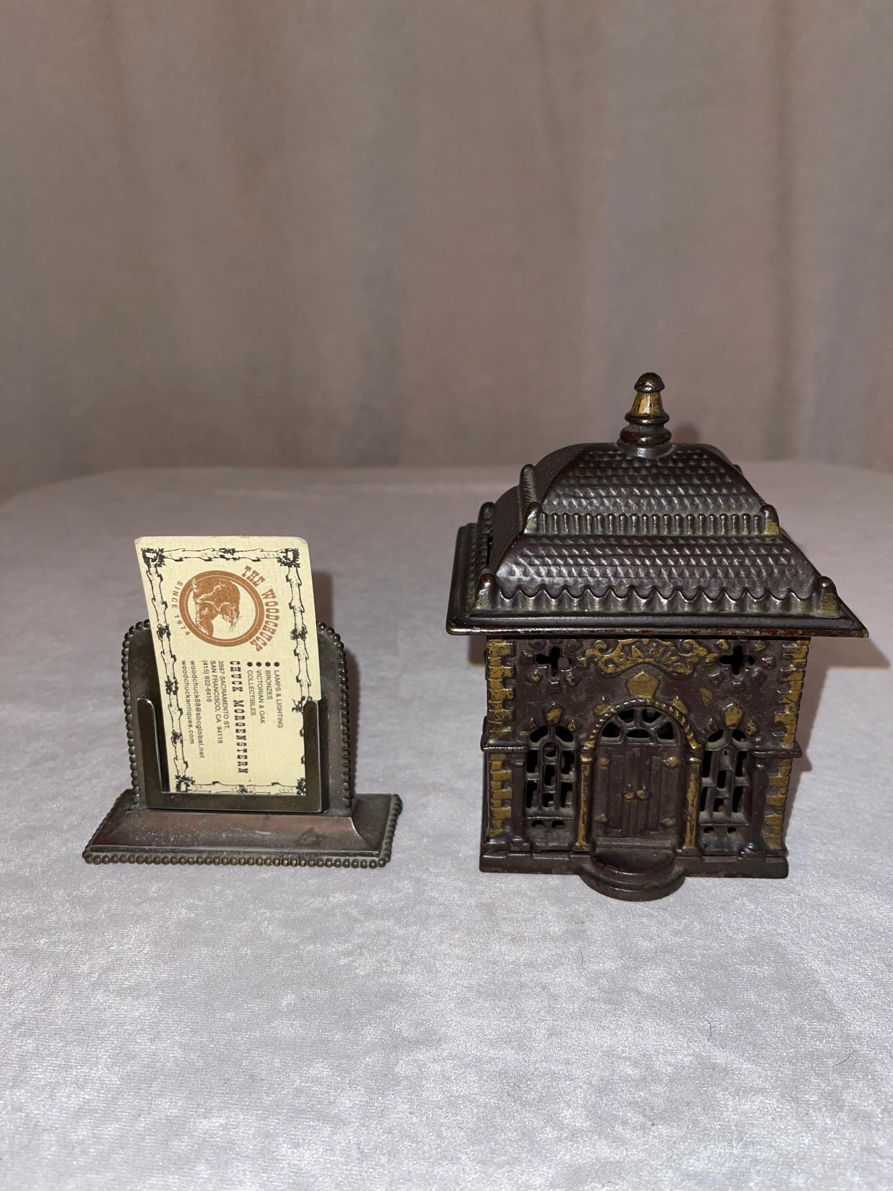One of the nicer cast iron still banks of a Bank. The paint is in fine condition, and there is nothing missing or broken. 
 These banks were produced for young children to encourage them to save their pennies. Adults can now buy them and use them